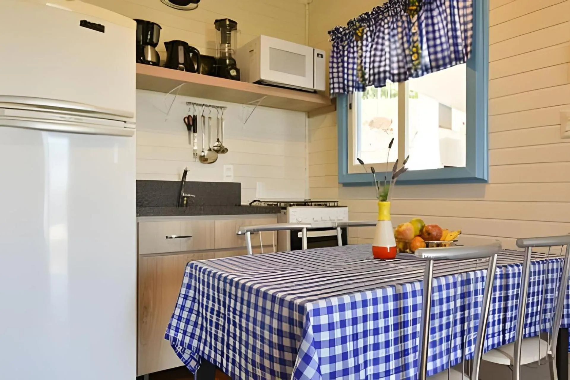 Kitchen or kitchenette in Stillo Gramado Linha Bonita