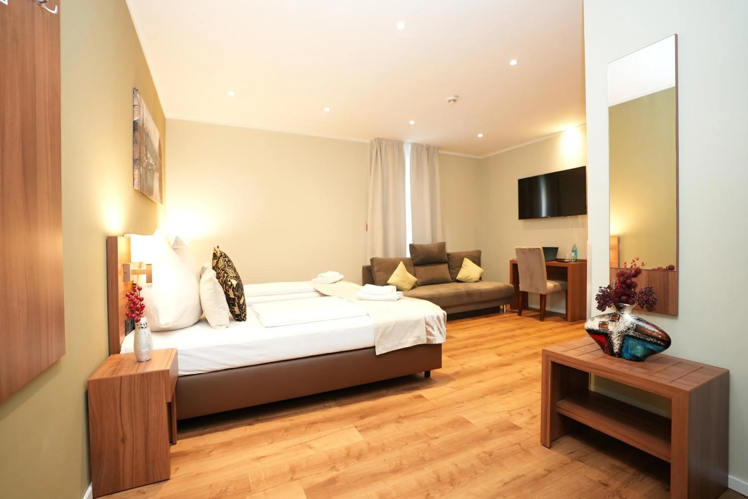 Bed in Hotel Attaché an der Messe