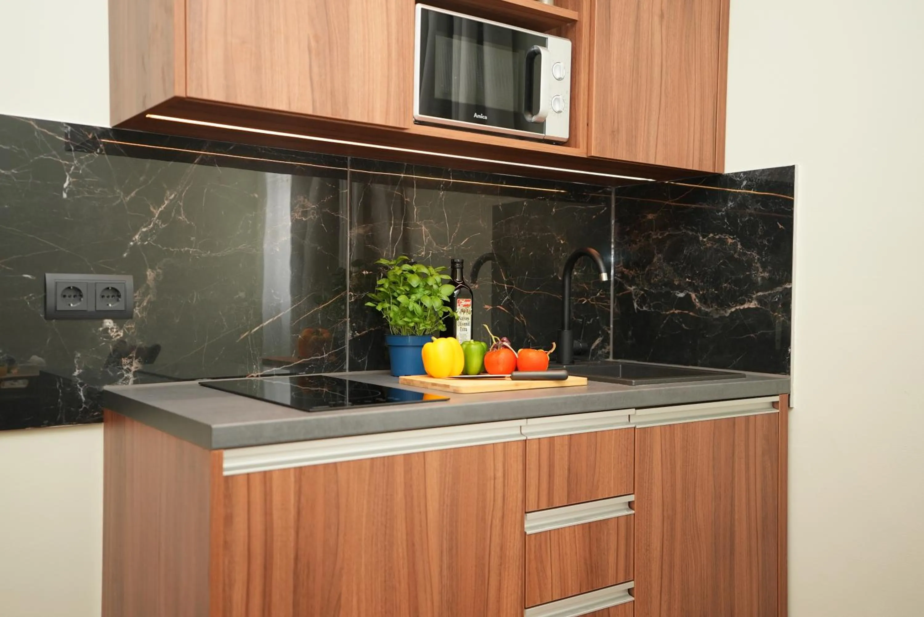 Kitchen or kitchenette in Hotel Attaché an der Messe