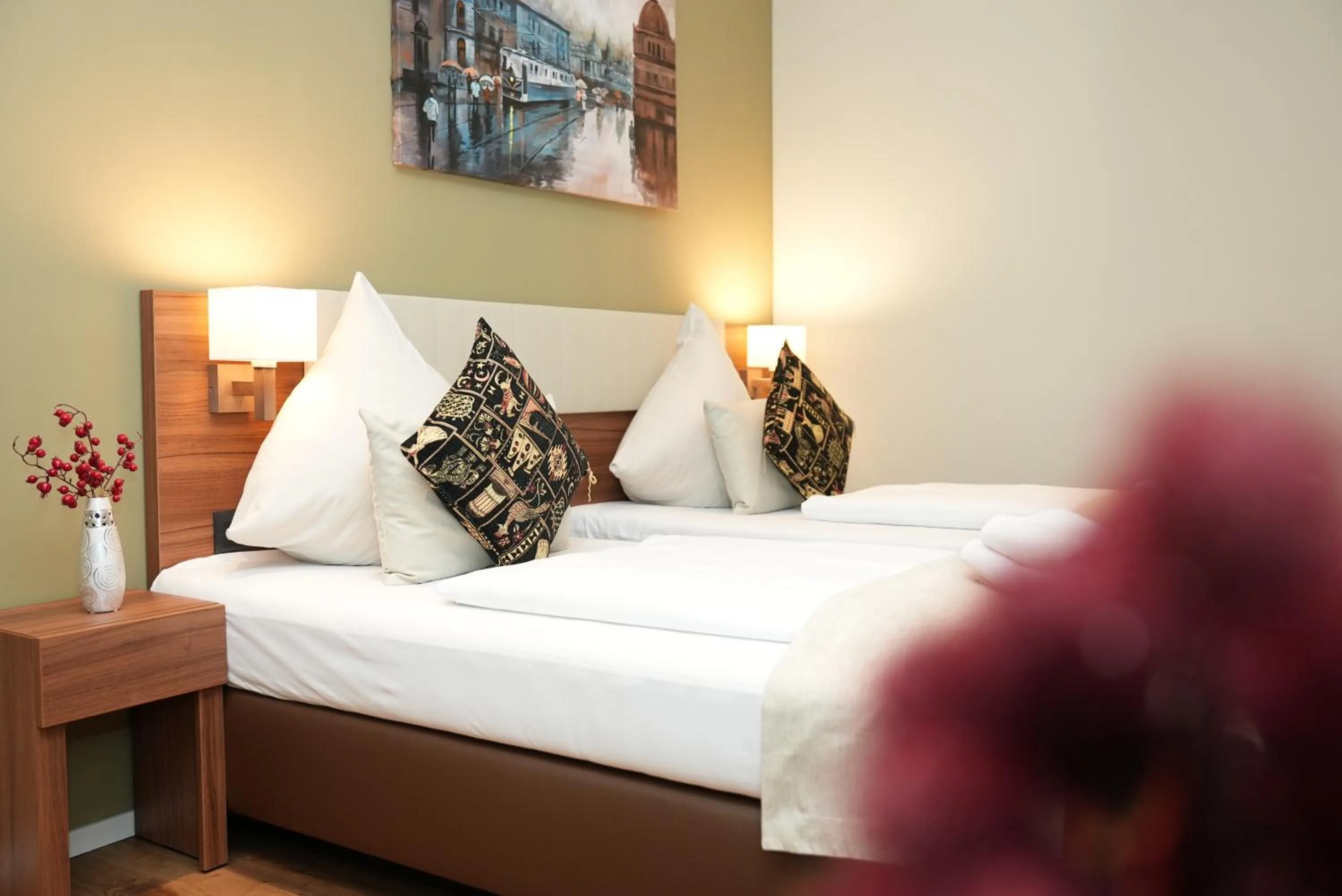 Bed in Hotel Attaché an der Messe