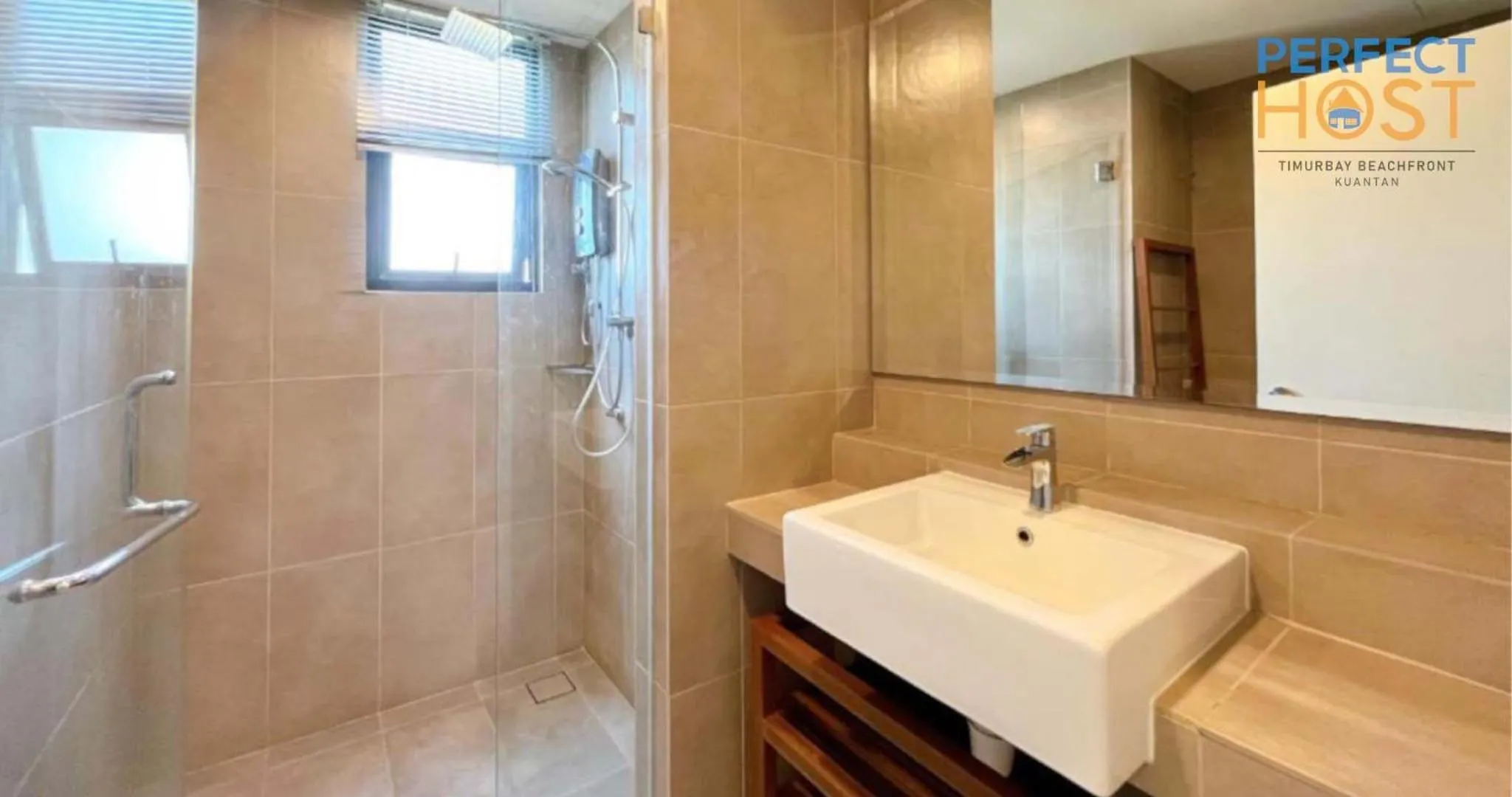 Shower in Timurbay Beachfront by Perfect Host