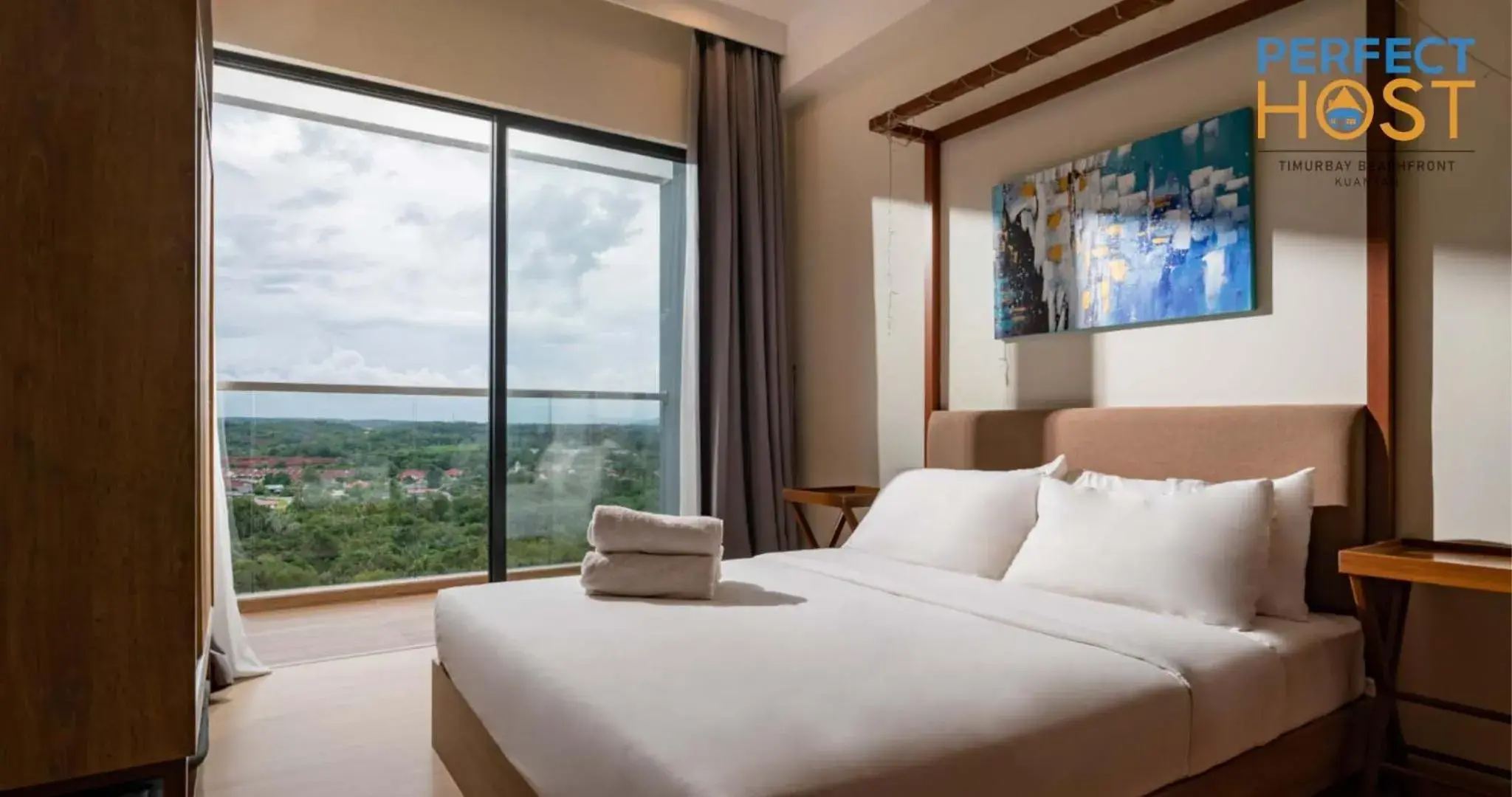 Bed in Timurbay Beachfront by Perfect Host Bed in Timurbay Beachfront by Perfect Host