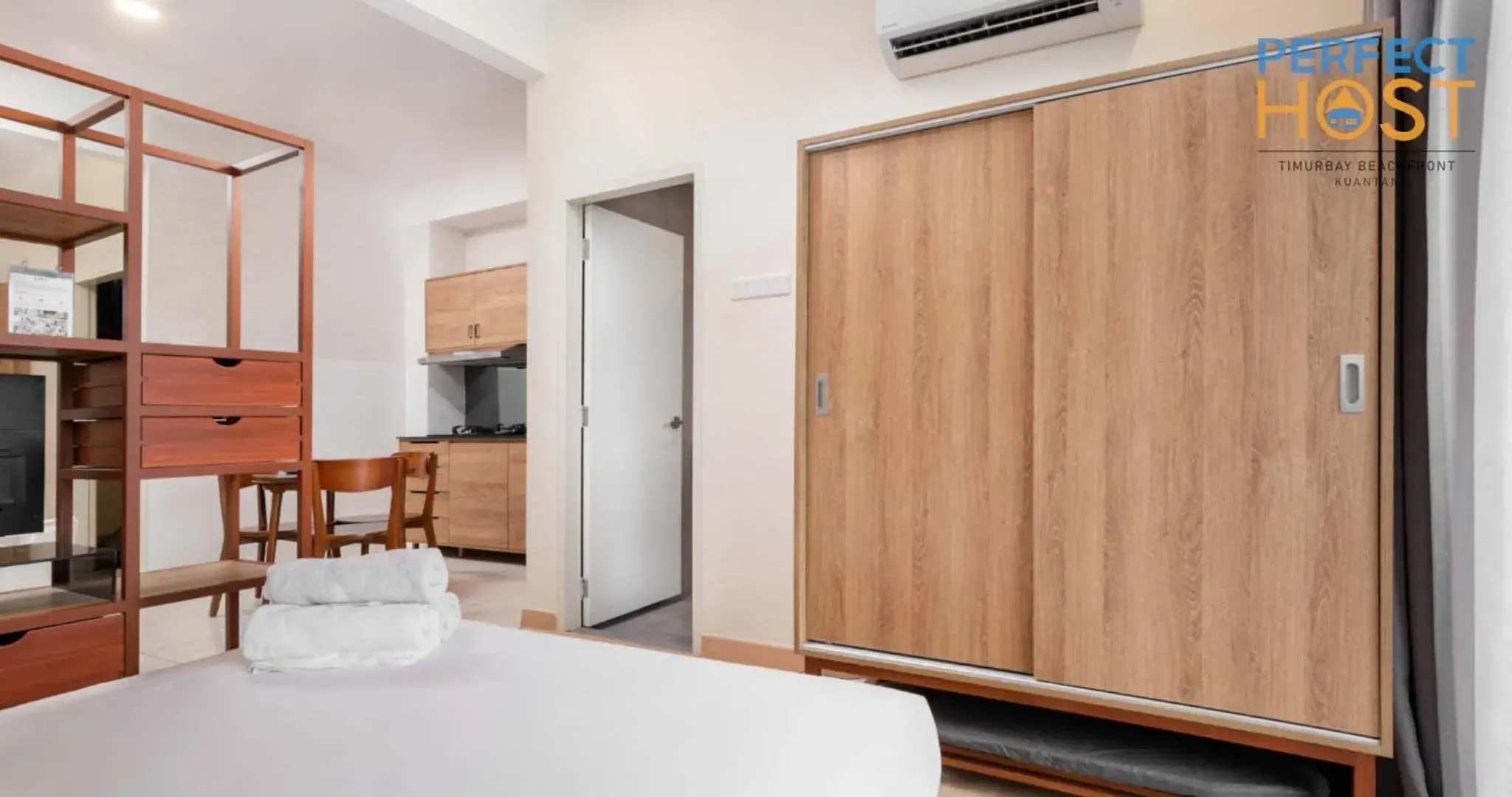 Bed in Timurbay Beachfront by Perfect Host Bed in Timurbay Beachfront by Perfect Host