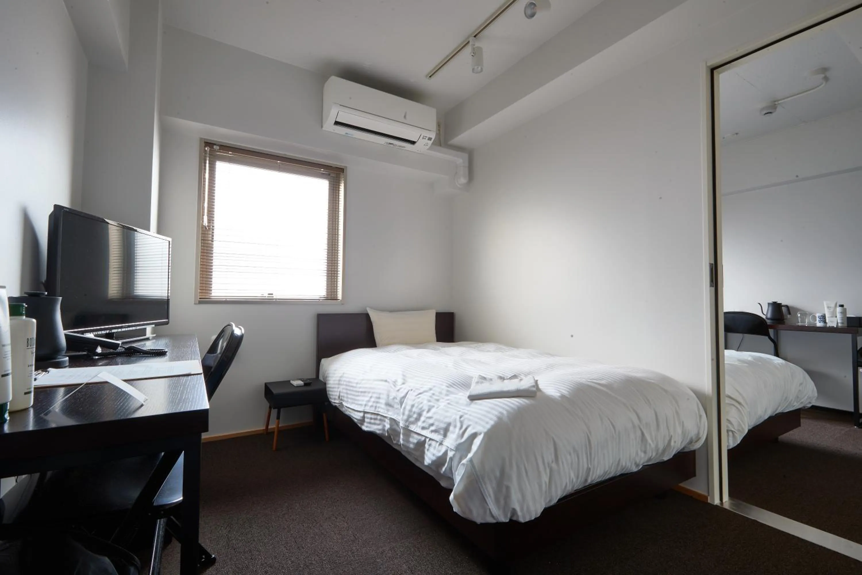 Bed in 8HOTEL Chigasaki