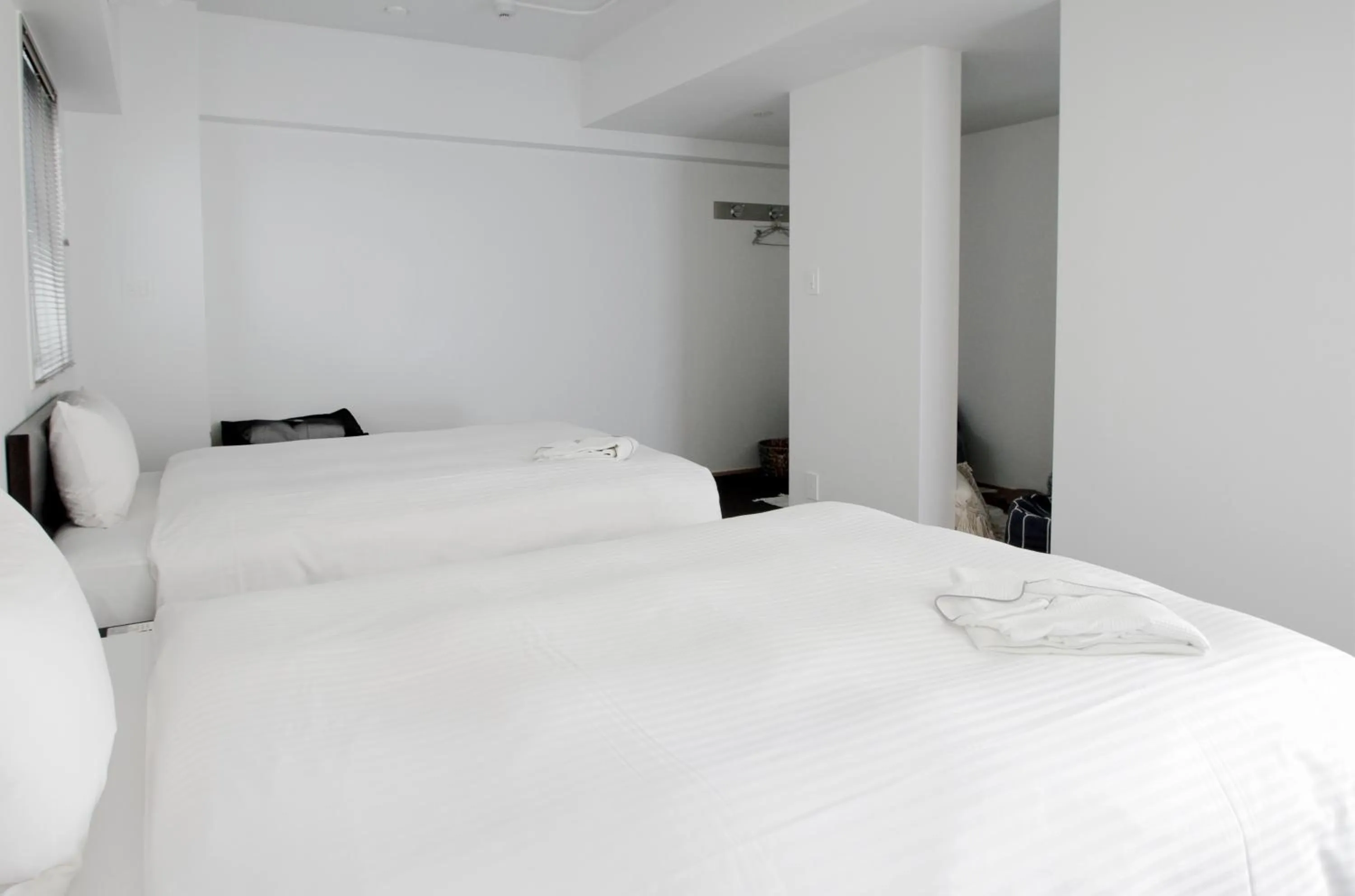 Bed in 8HOTEL Chigasaki