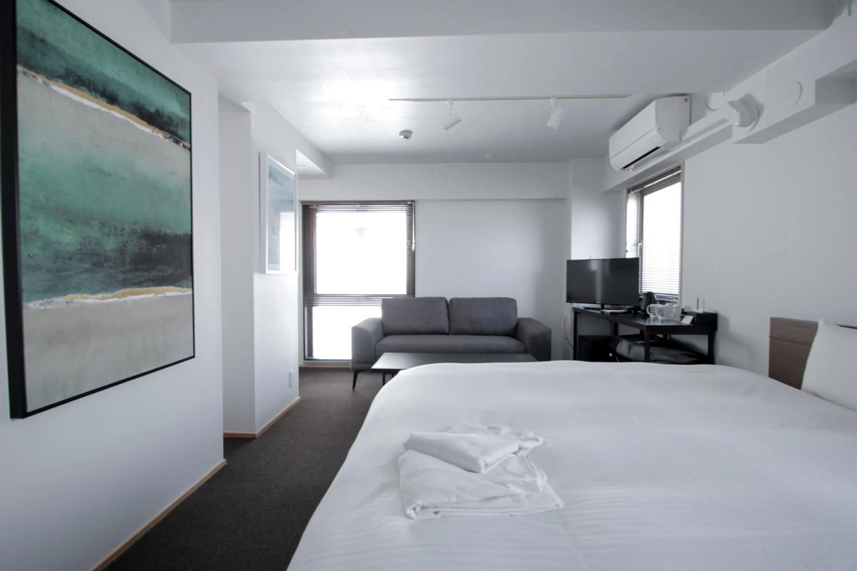 Bed in 8HOTEL Chigasaki