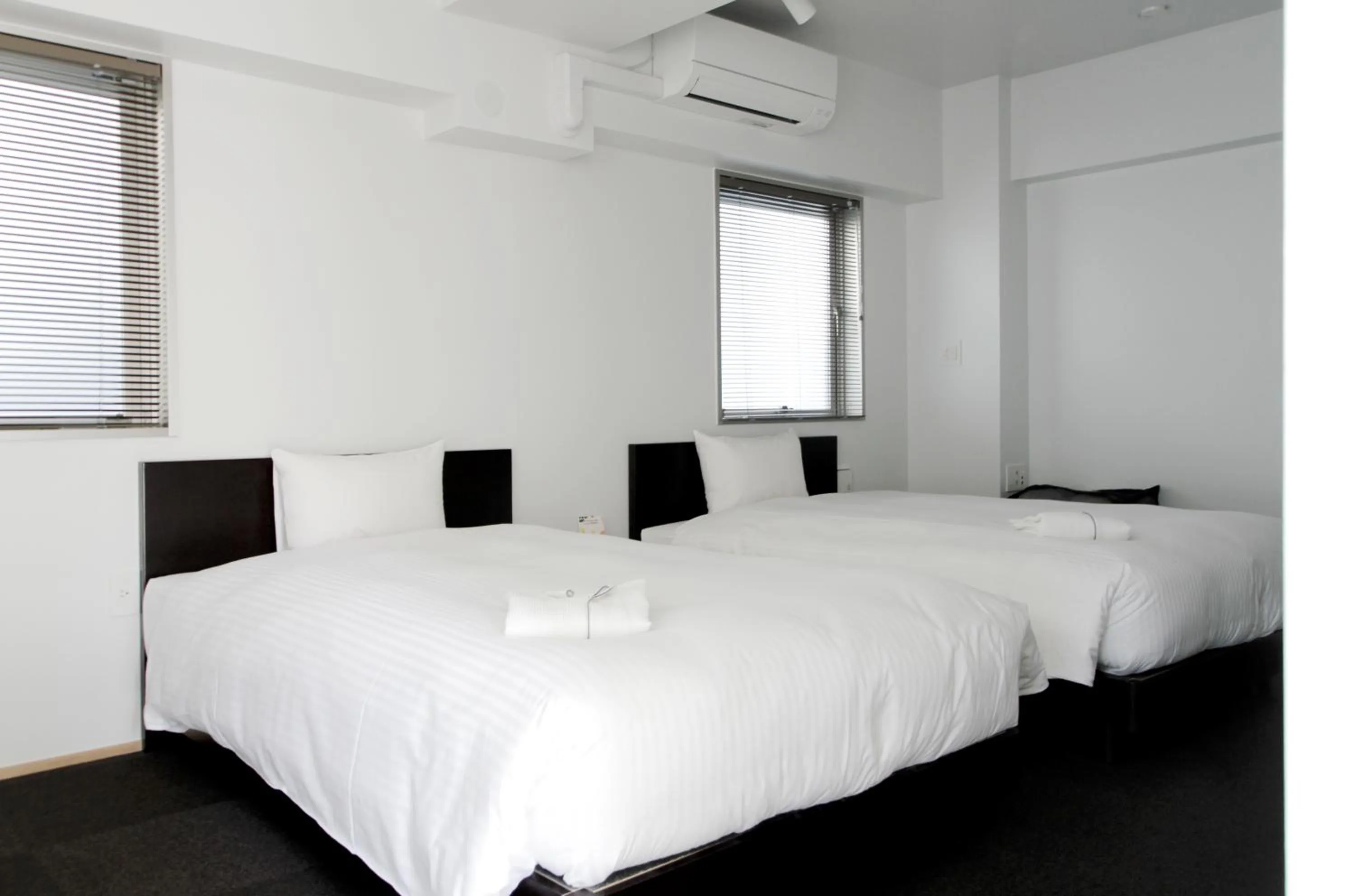 Bed in 8HOTEL Chigasaki