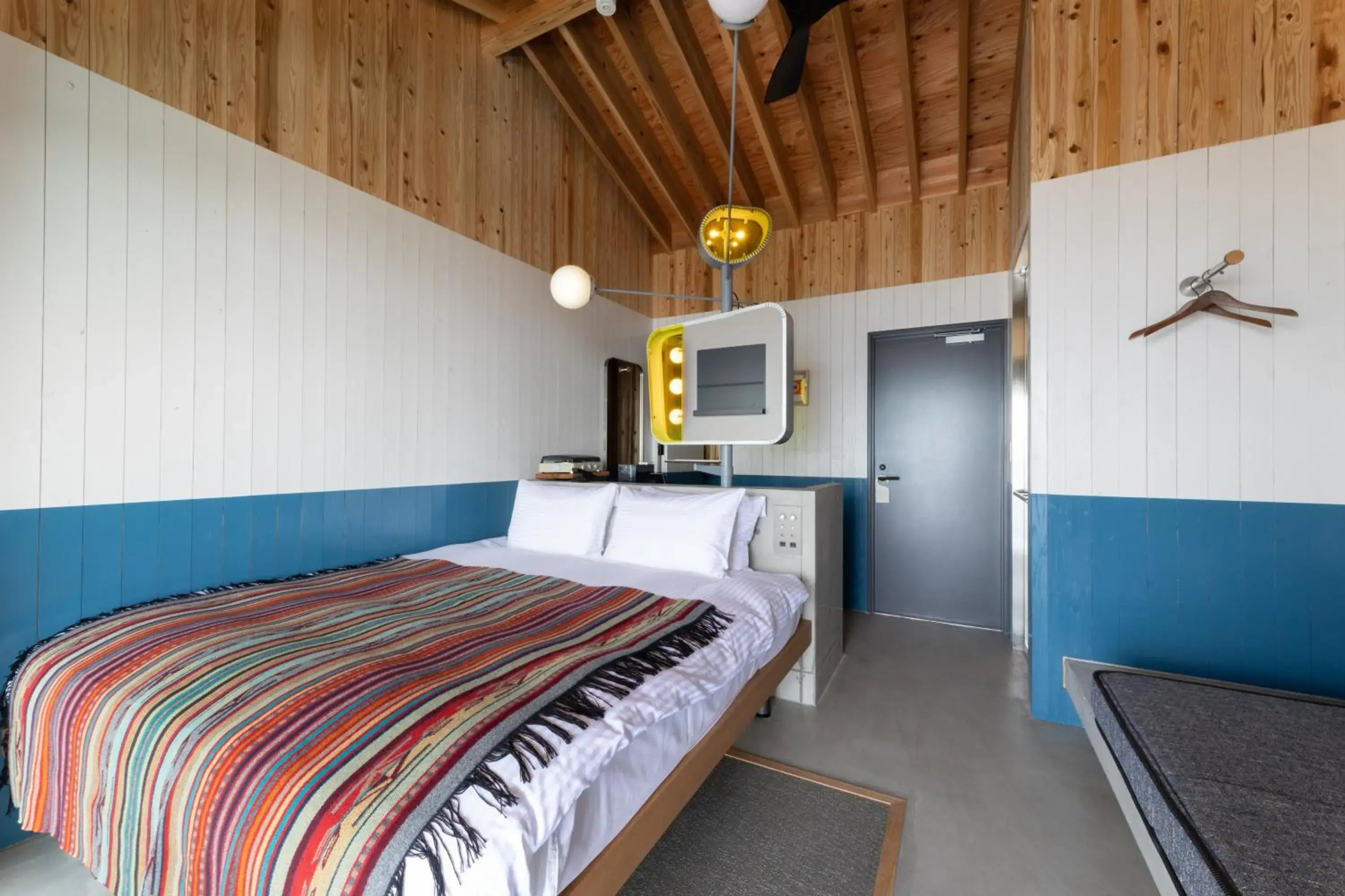 Bed in KAMOME SLOW HOTEL Bed in KAMOME SLOW HOTEL