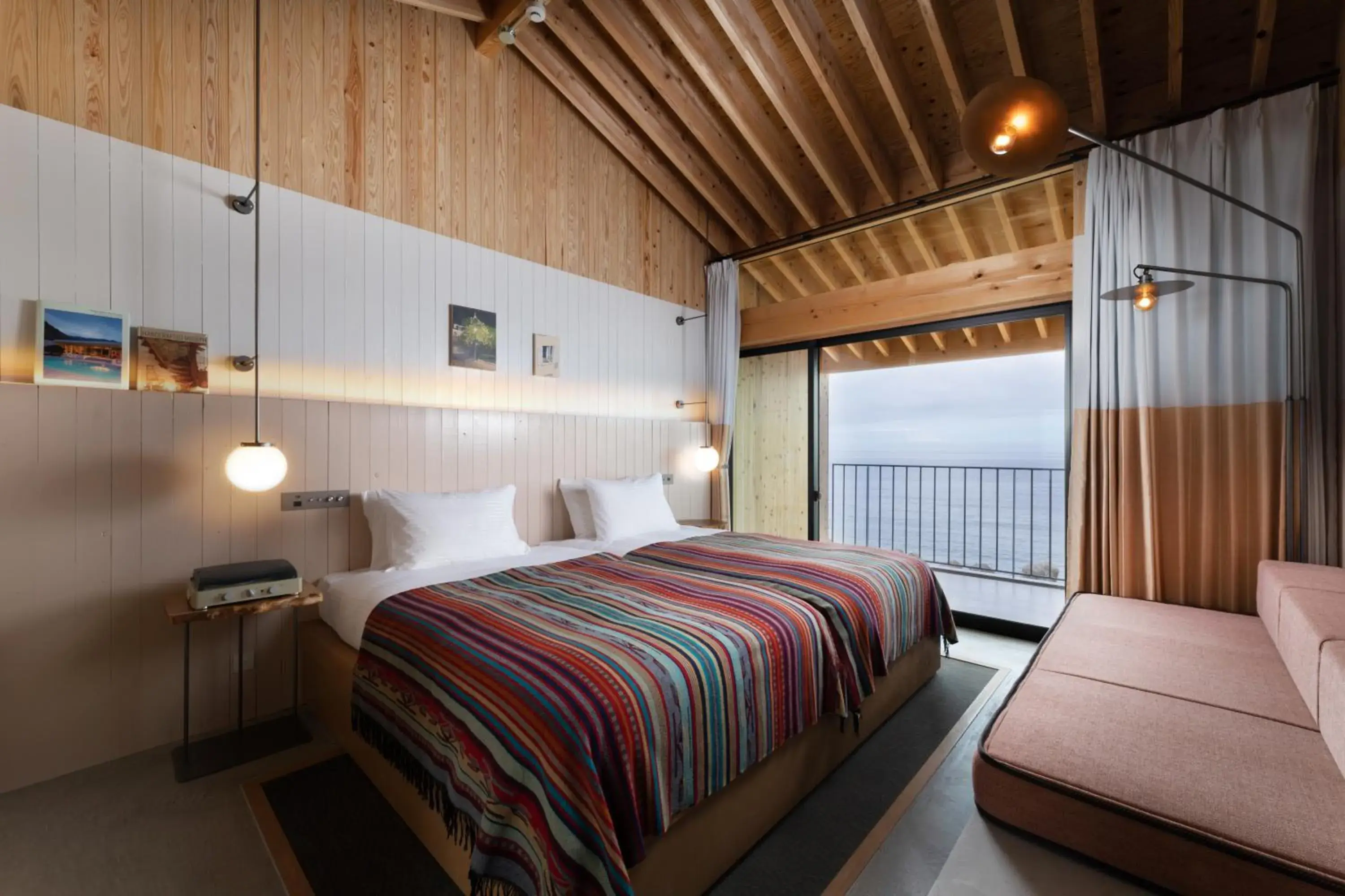 Bed in KAMOME SLOW HOTEL Bed in KAMOME SLOW HOTEL