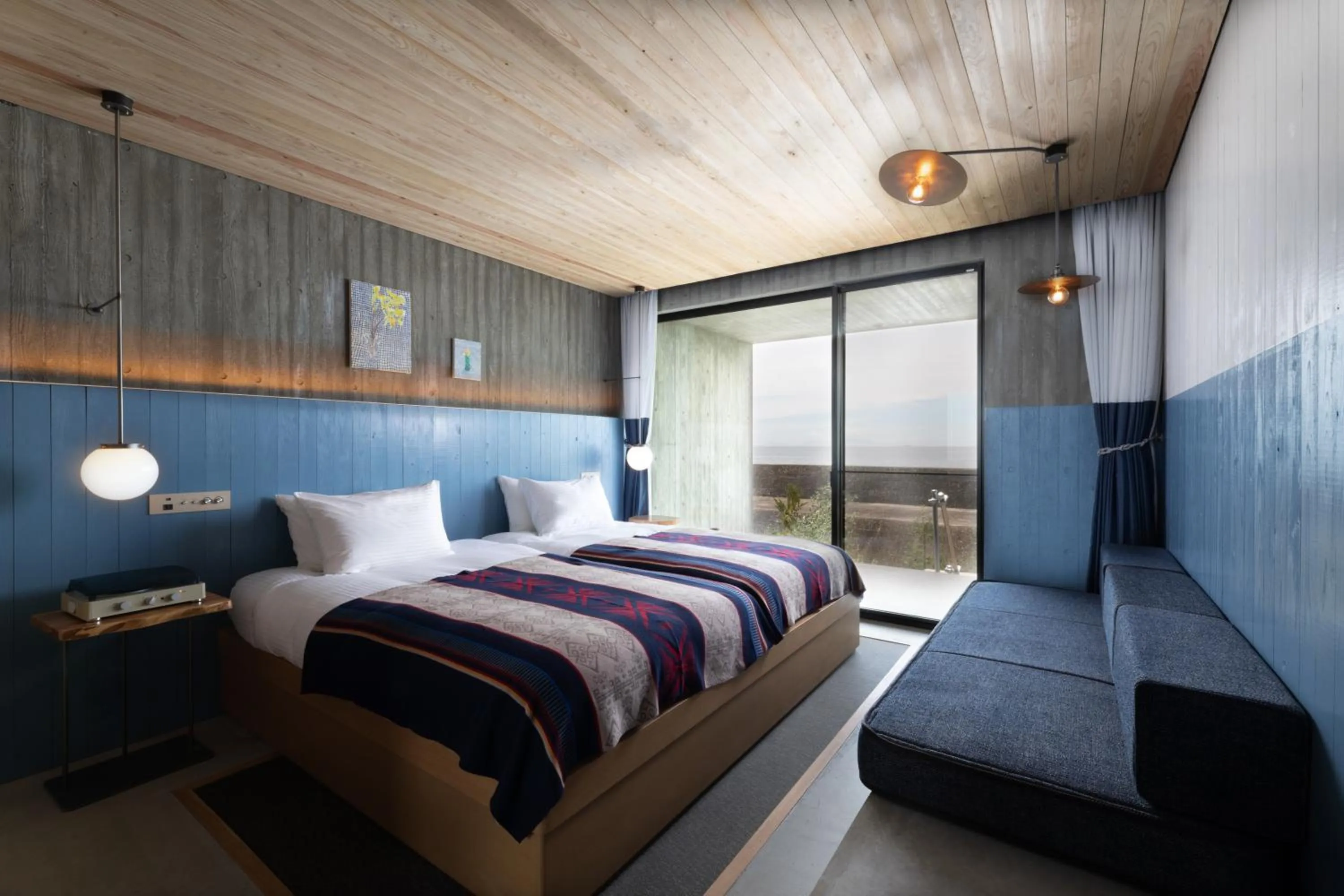 Bed in KAMOME SLOW HOTEL