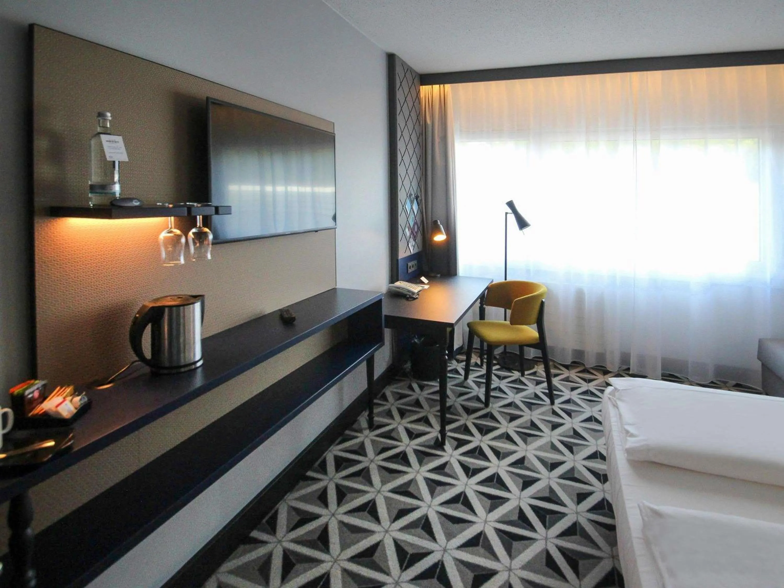 Bedroom, Bed in Mercure Hotel Freiburg am Münster