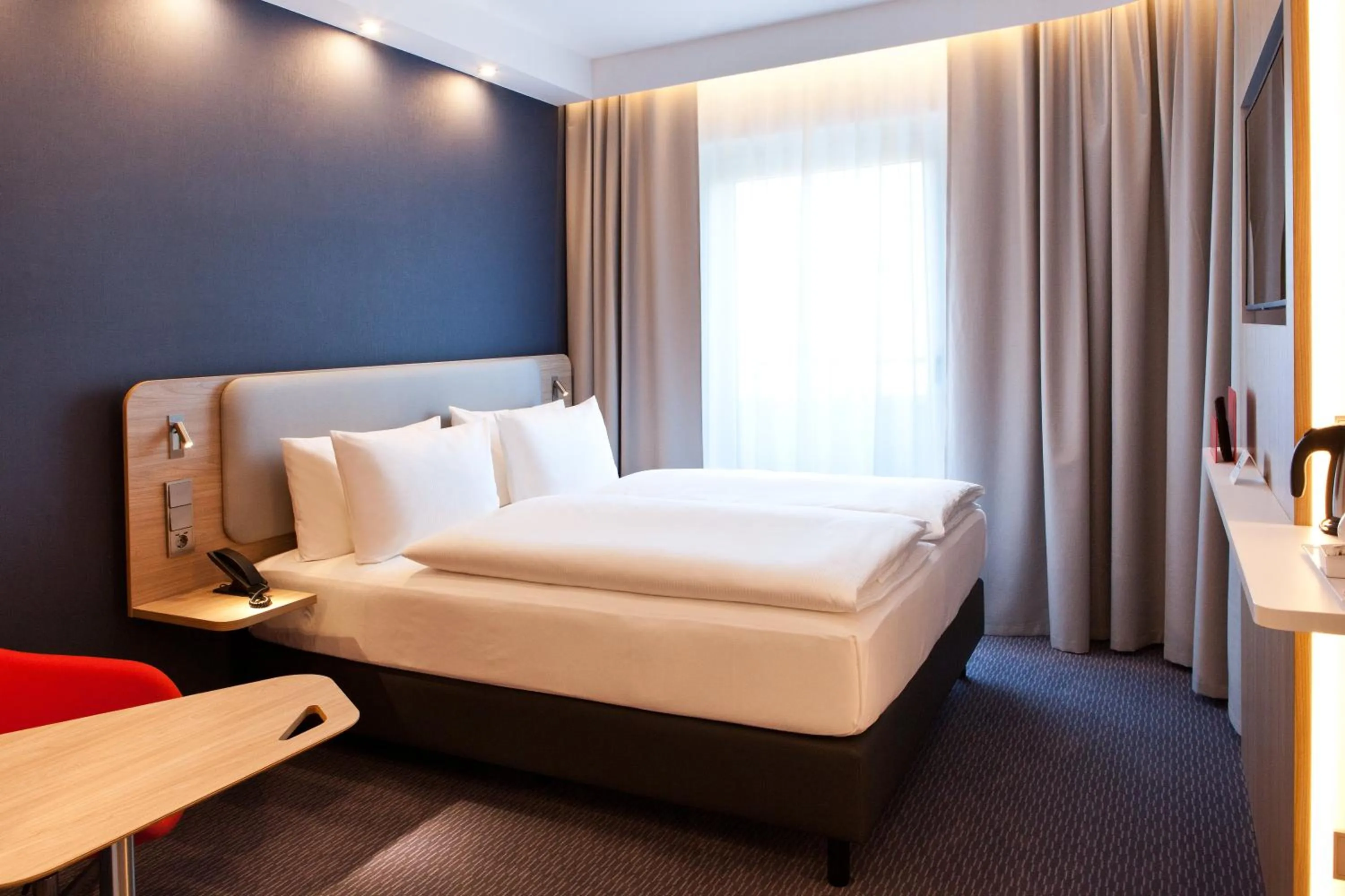Photo of the whole room, Bed in Holiday Inn Express Munich - Olching by IHG