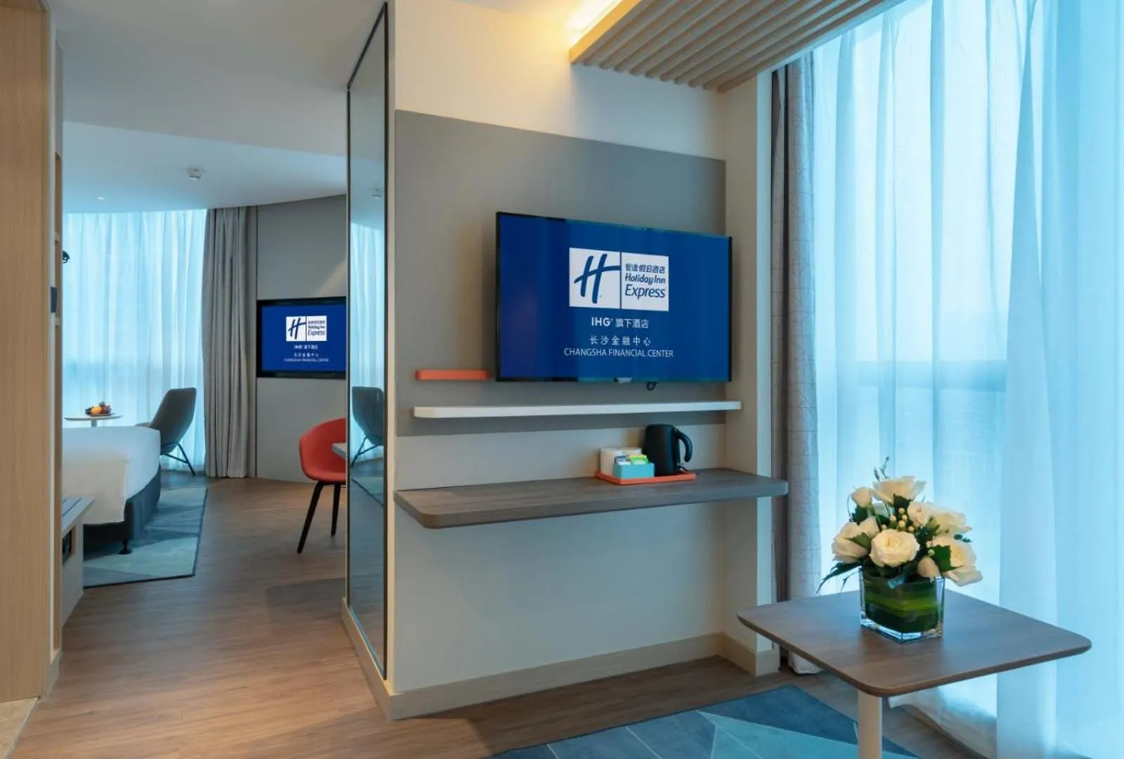 Communal lounge/ TV room in Holiday Inn Express Changsha Wuyi Plaza by IHG
