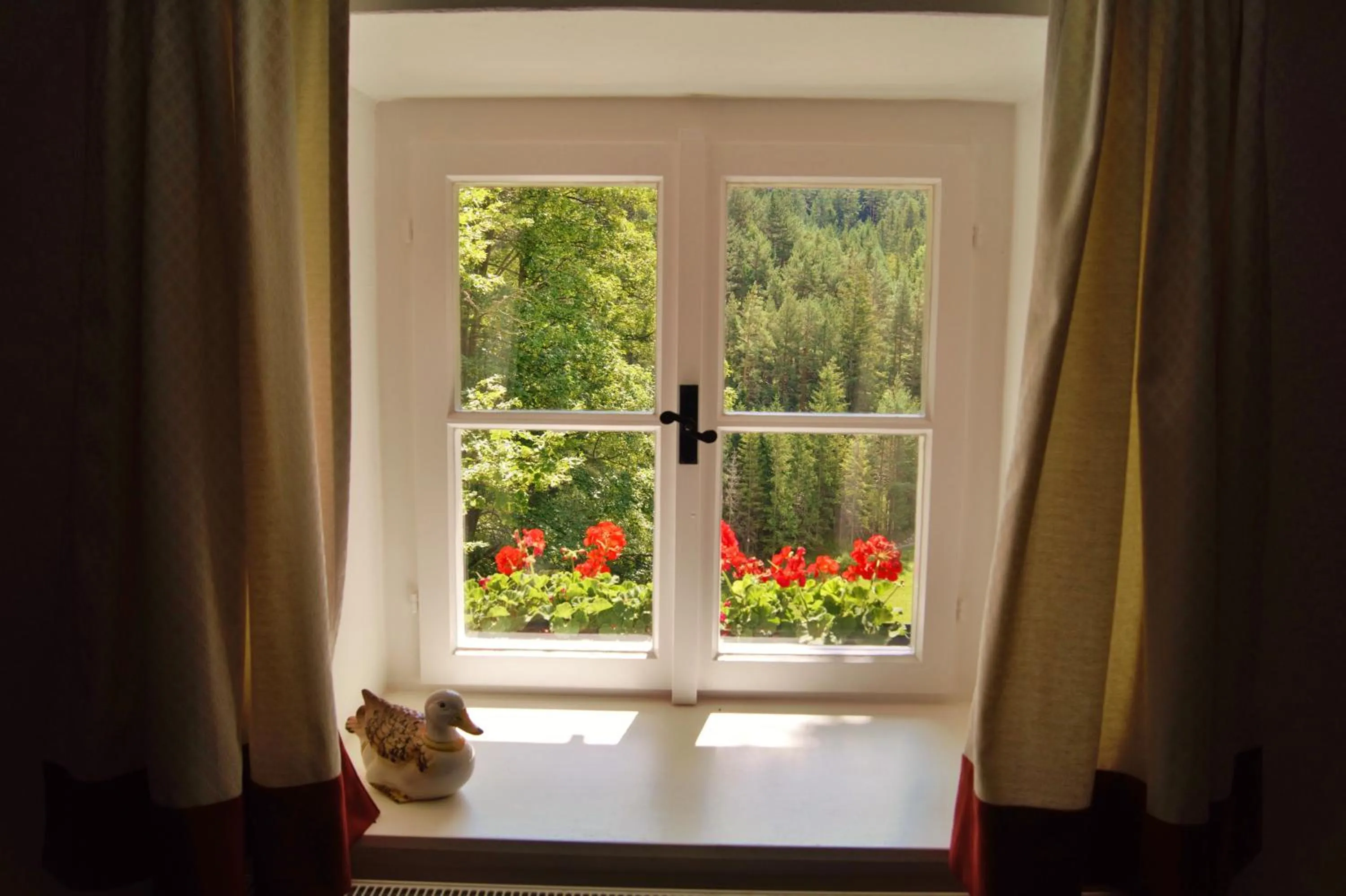 Garden view in LANDSITZ OBERHOF petit hôtel