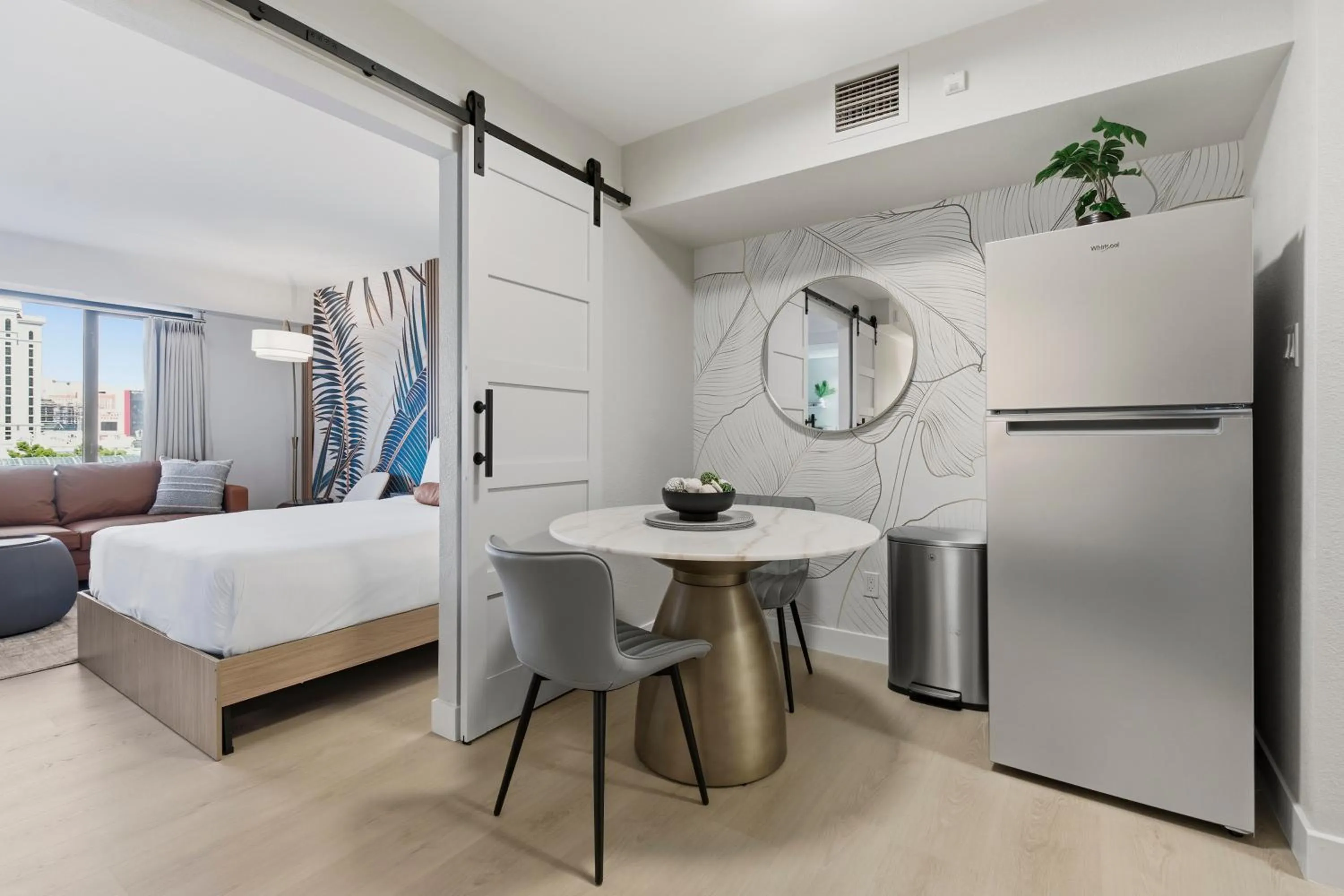 Dining area, Bed in StripViewSuites at Jockey Club