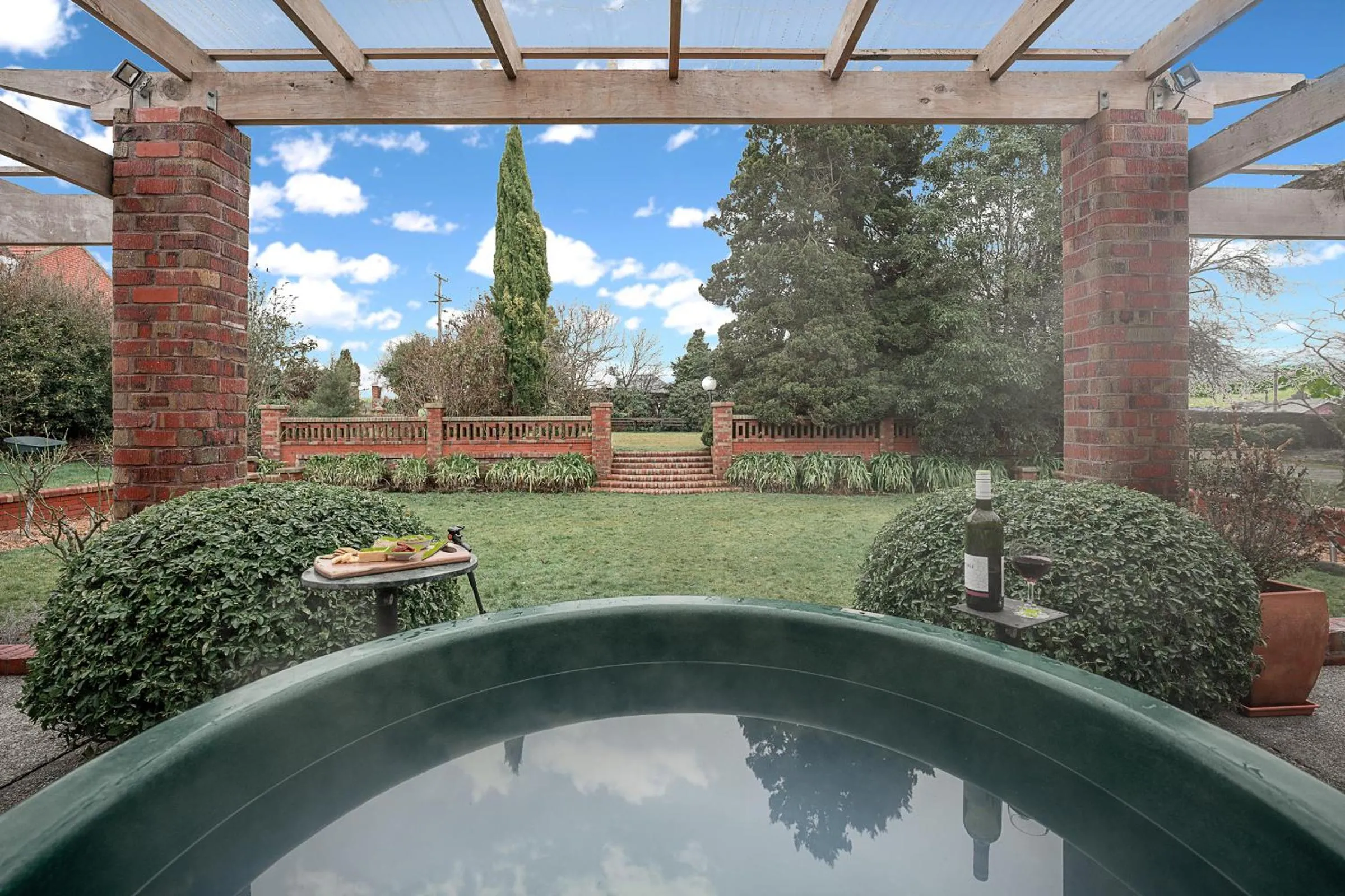 Pool view in The Fern & Thistle Luxury Accommodation- Drinks, Hotpool, Sauna