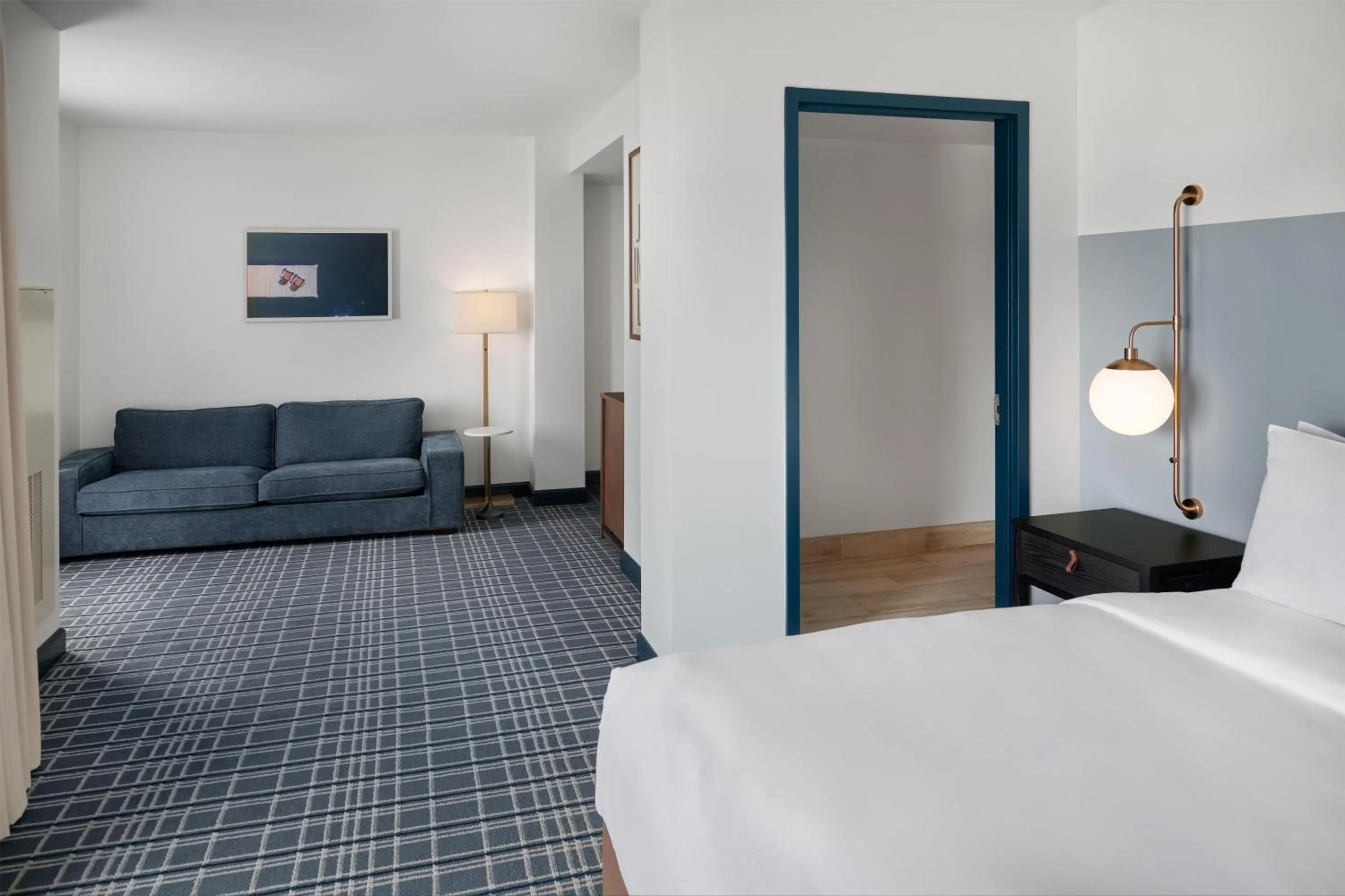 Living room, Bed in Hotel Canandaigua, Tapestry Collection By Hilton