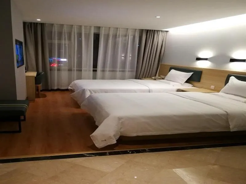 Bed in 7Days Premium Dalian Xinghai Square Xi'an Road Subway Station Branch