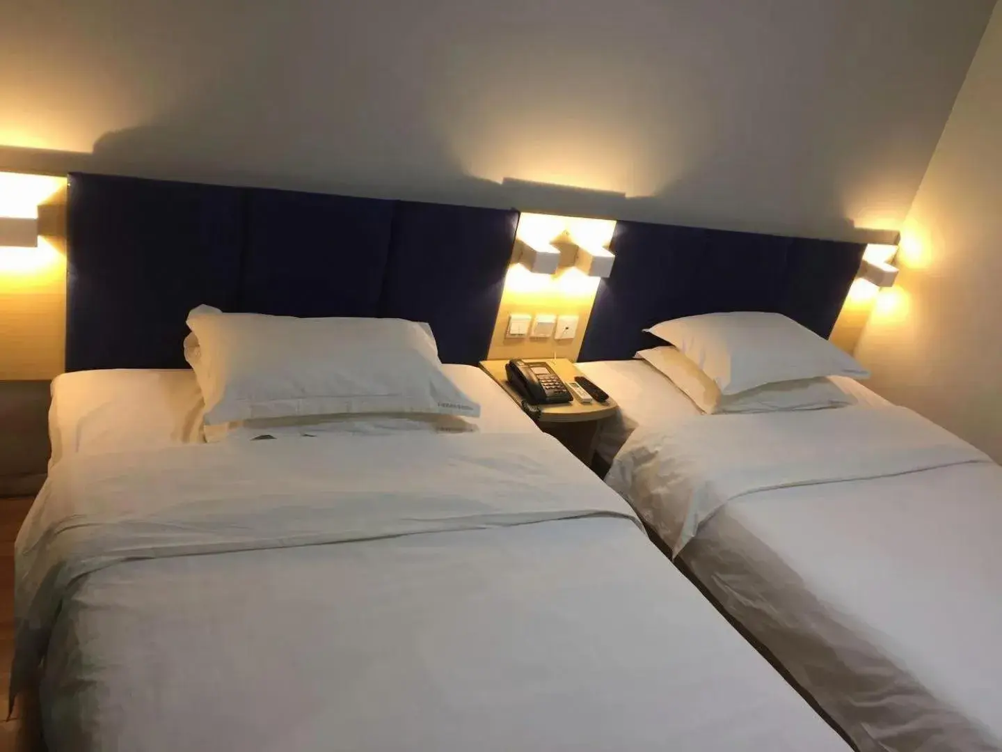 Bed in 7Days Inn Laiwu New Bus Station Branch Bed in 7Days Inn Laiwu New Bus Station Branch