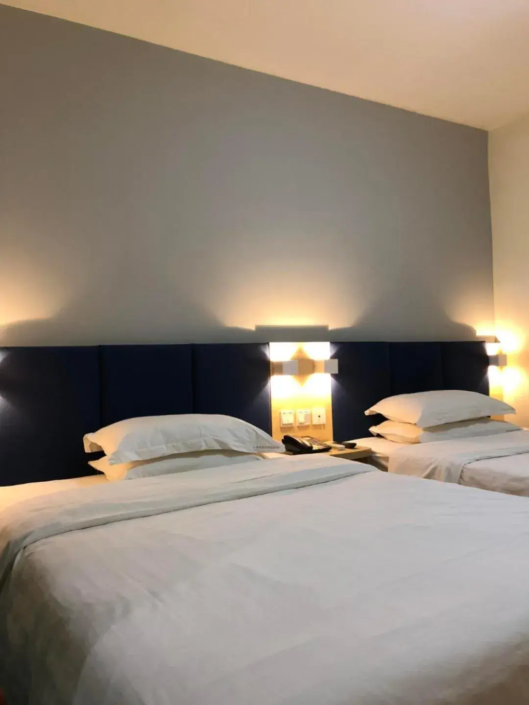 Bed in 7Days Inn Laiwu New Bus Station Branch Bed in 7Days Inn Laiwu New Bus Station Branch