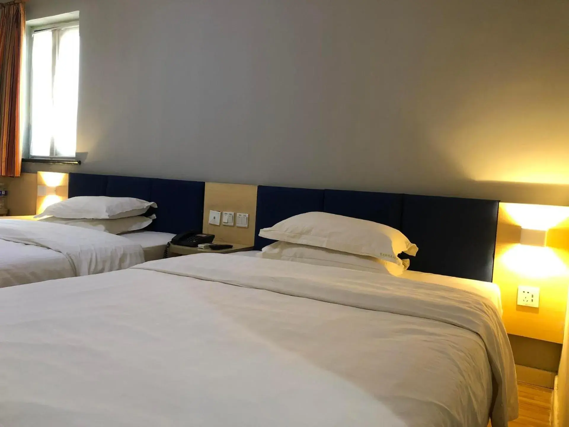 Bed in 7Days Inn Laiwu New Bus Station Branch Bed in 7Days Inn Laiwu New Bus Station Branch