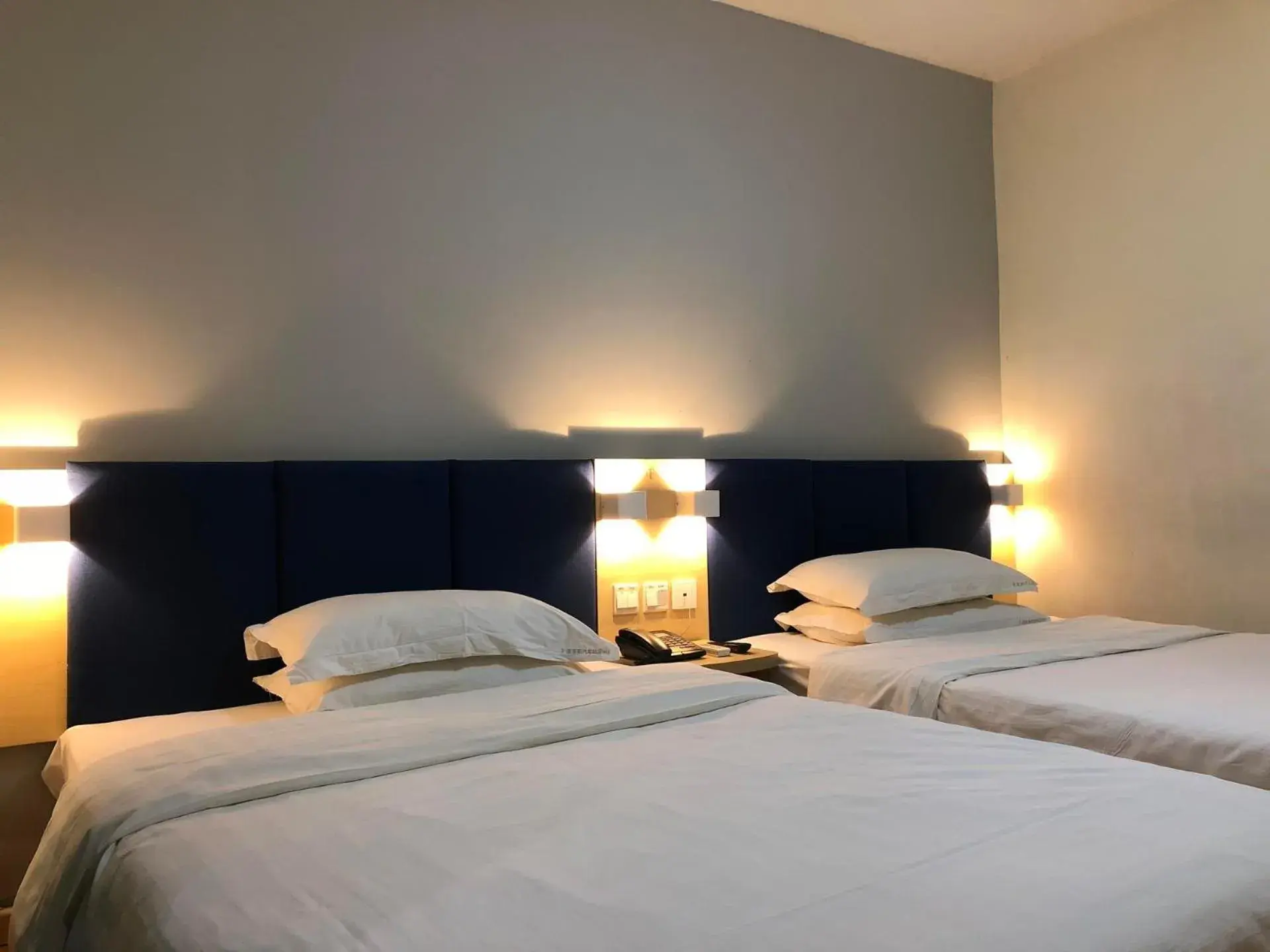 Bed in 7Days Inn Laiwu New Bus Station Branch Bed in 7Days Inn Laiwu New Bus Station Branch