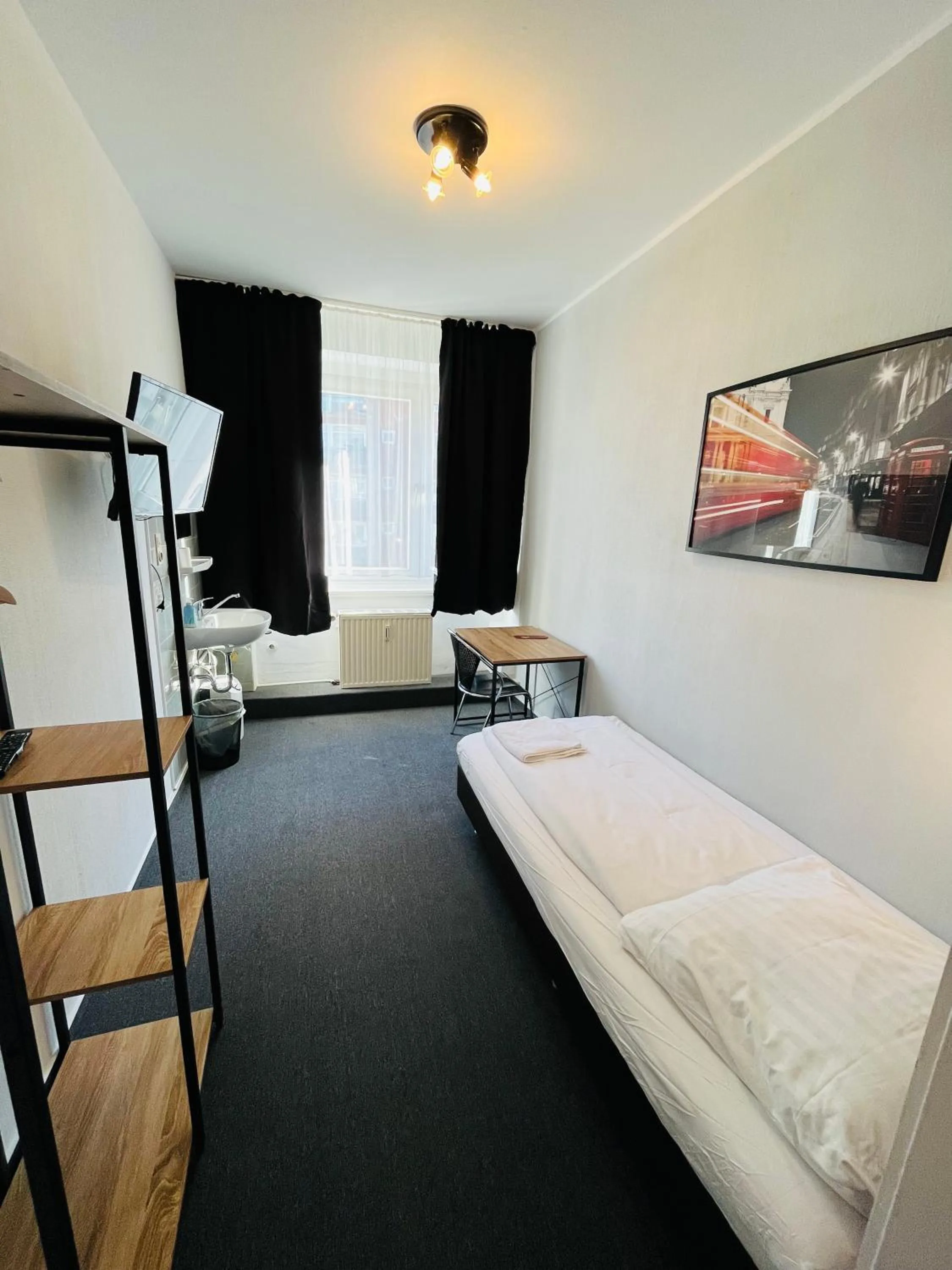 Photo of the whole room, Bed in Hotel Schwarzer Bär