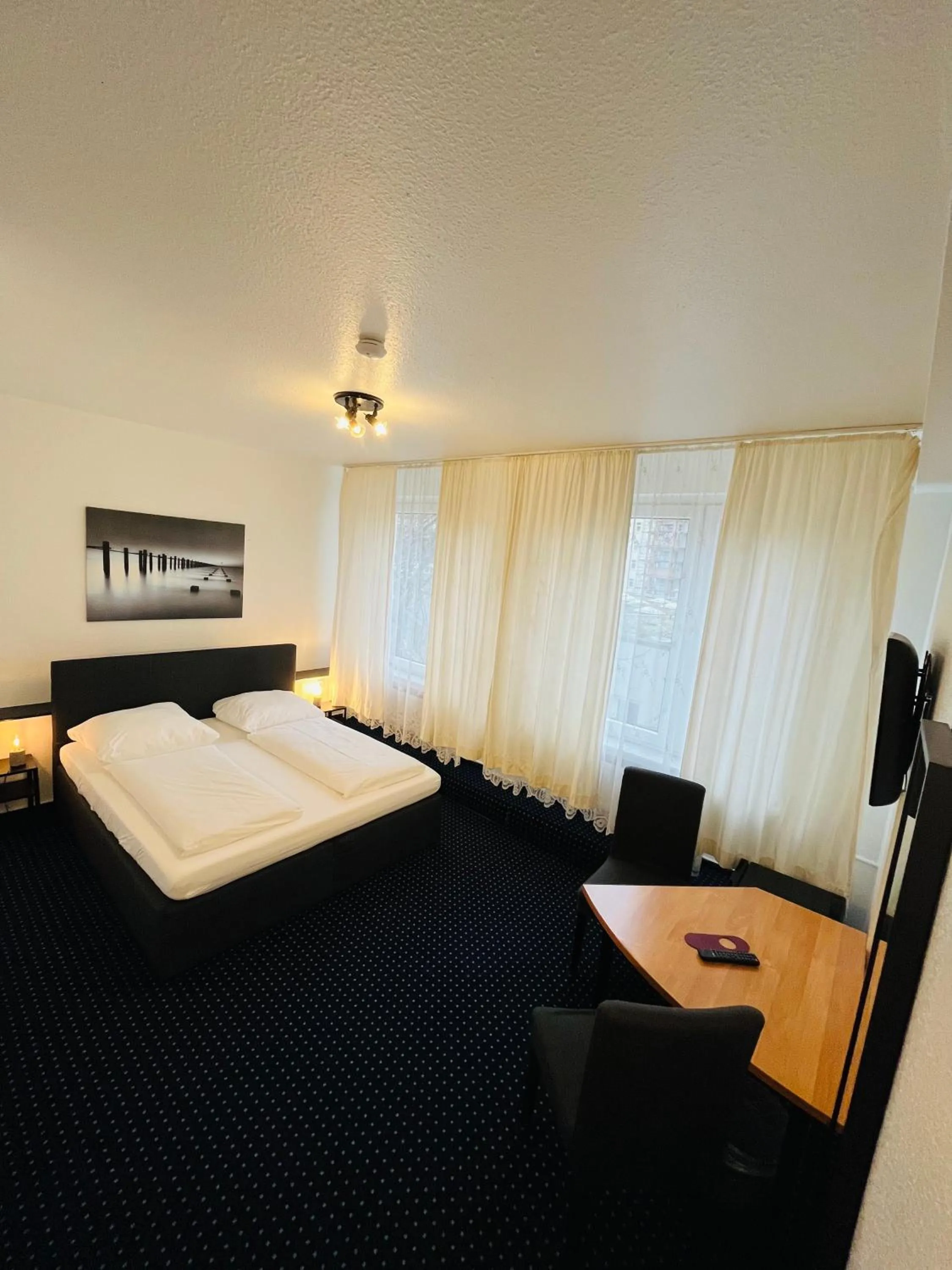 Bed in Hotel Schwarzer Bär