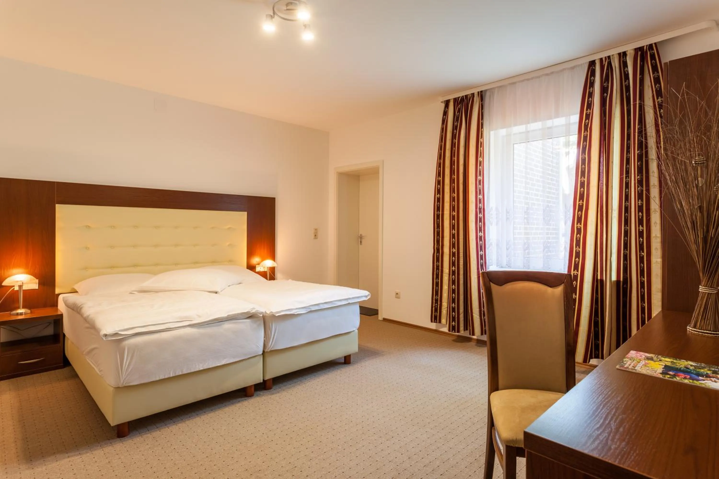 Photo of the whole room, Bed in Landhotel Zur Linde