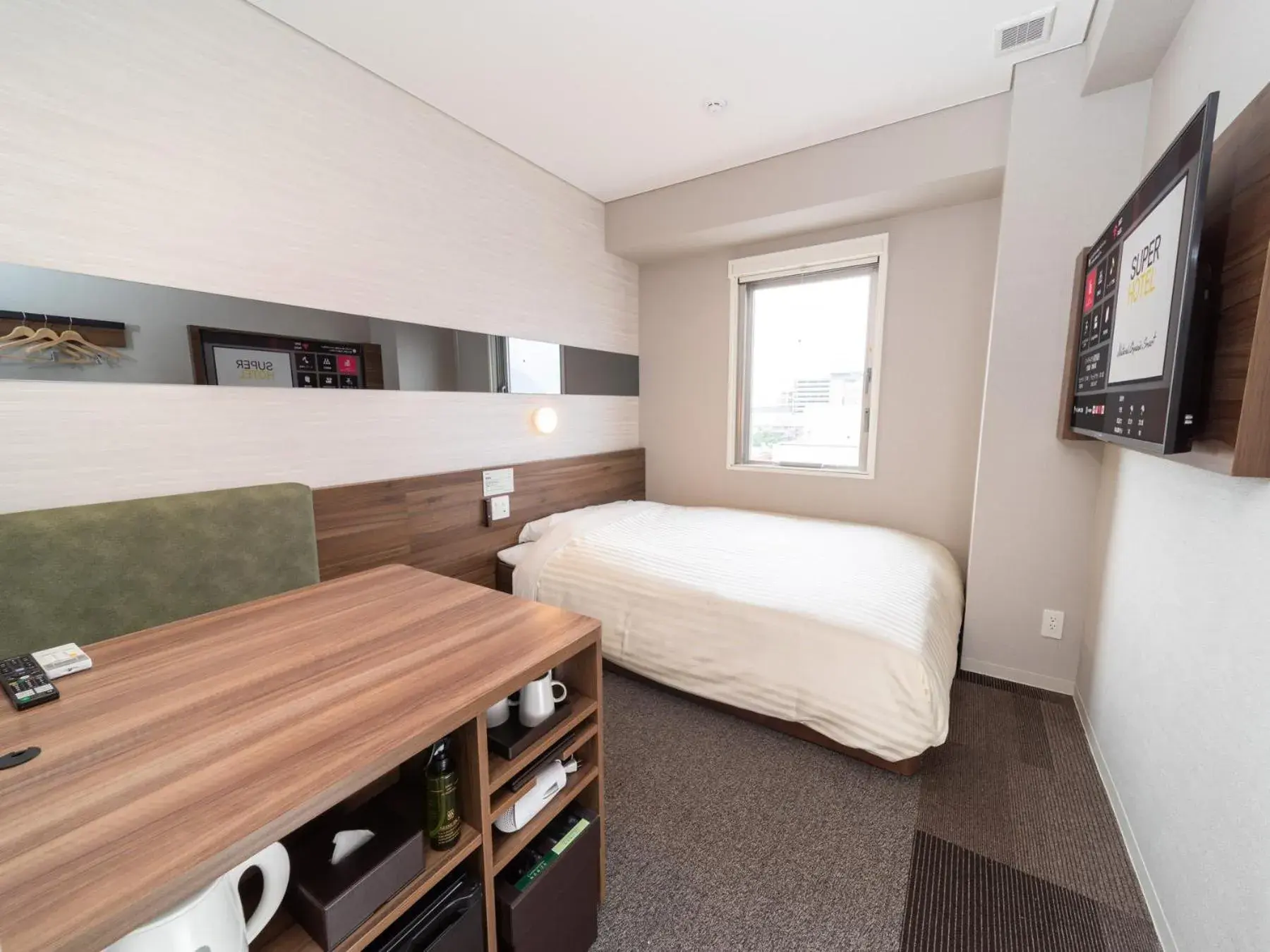 Bed in Super Hotel Beppu Ekimae Bed in Super Hotel Beppu Ekimae