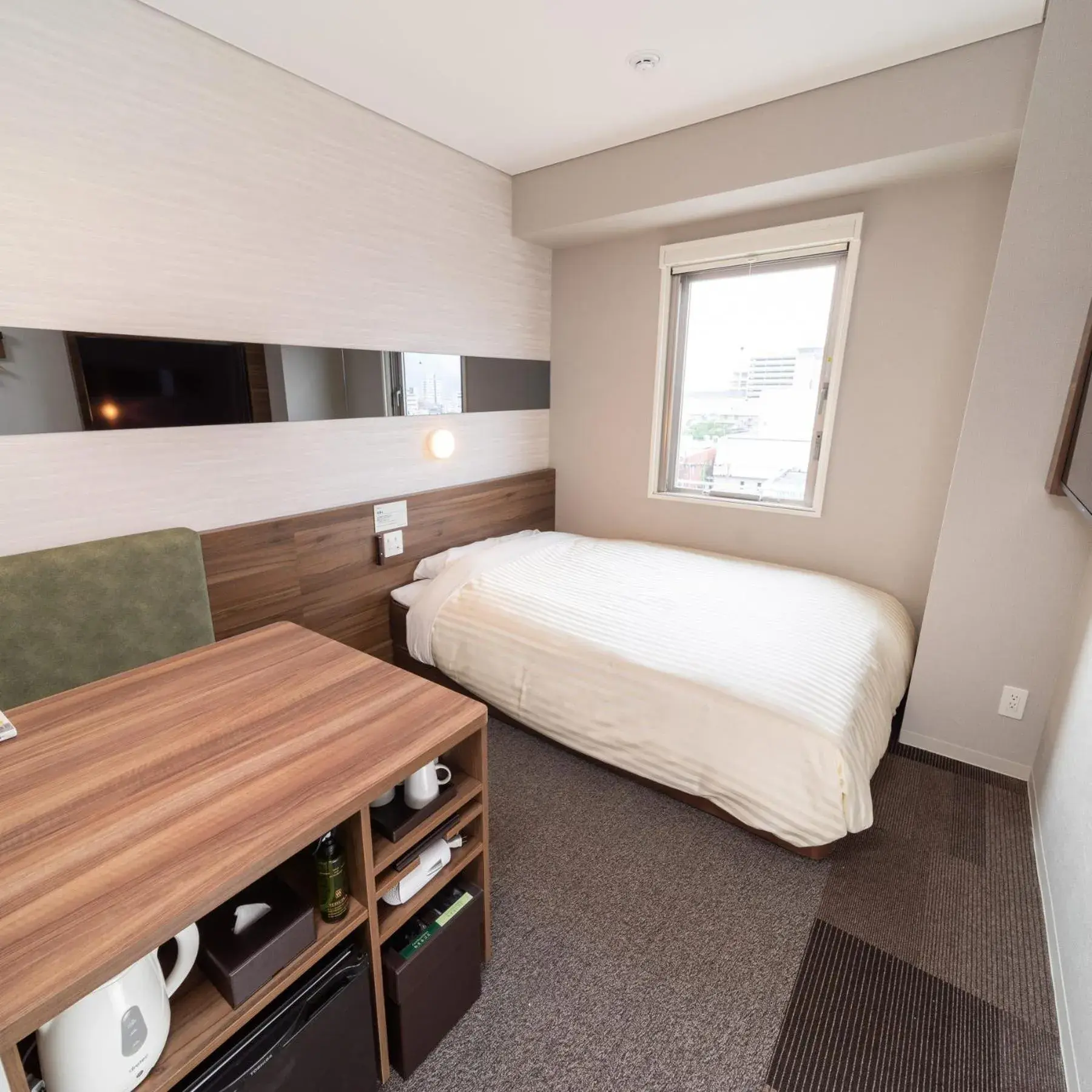 Bed in Super Hotel Beppu Ekimae Bed in Super Hotel Beppu Ekimae