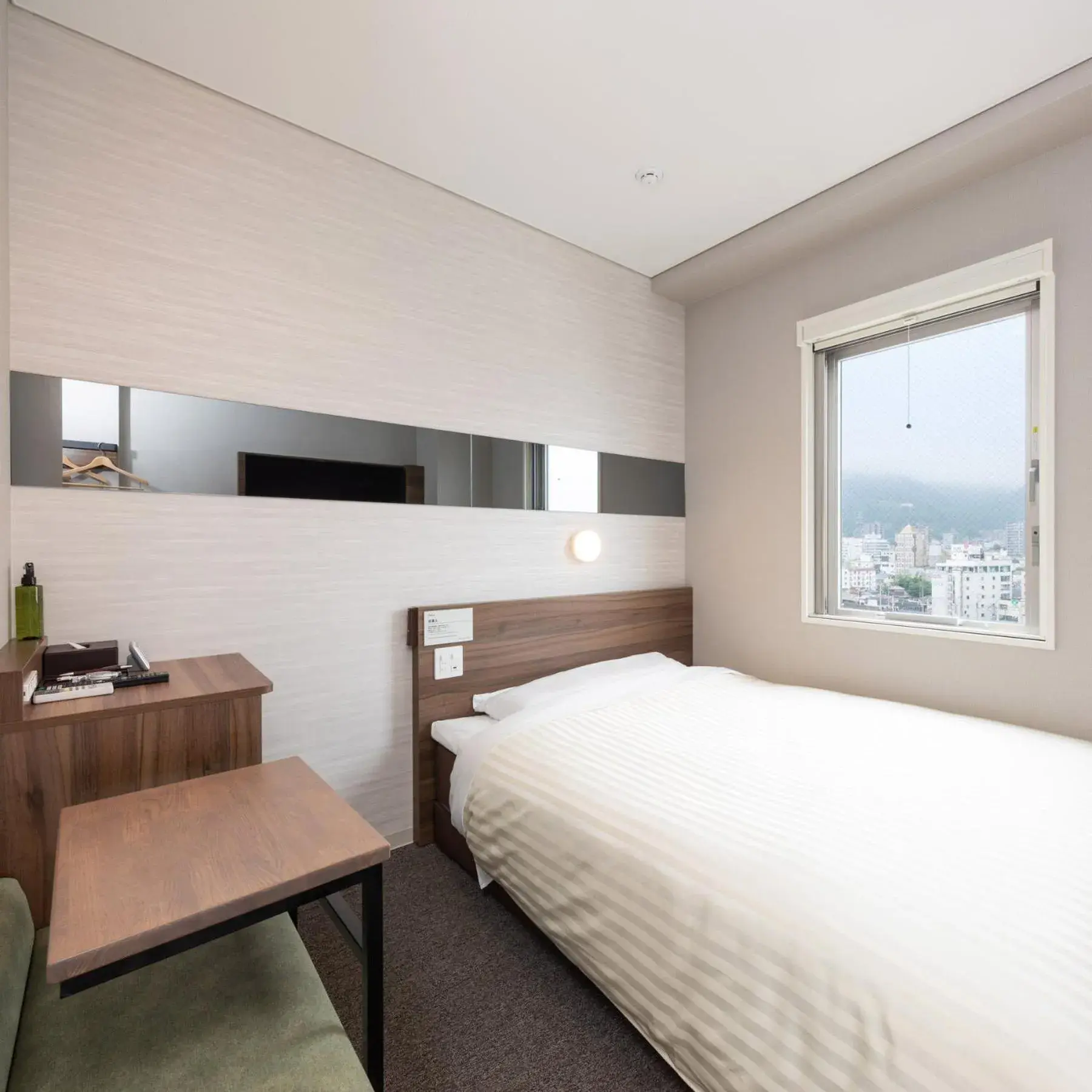 Bed in Super Hotel Beppu Ekimae Bed in Super Hotel Beppu Ekimae