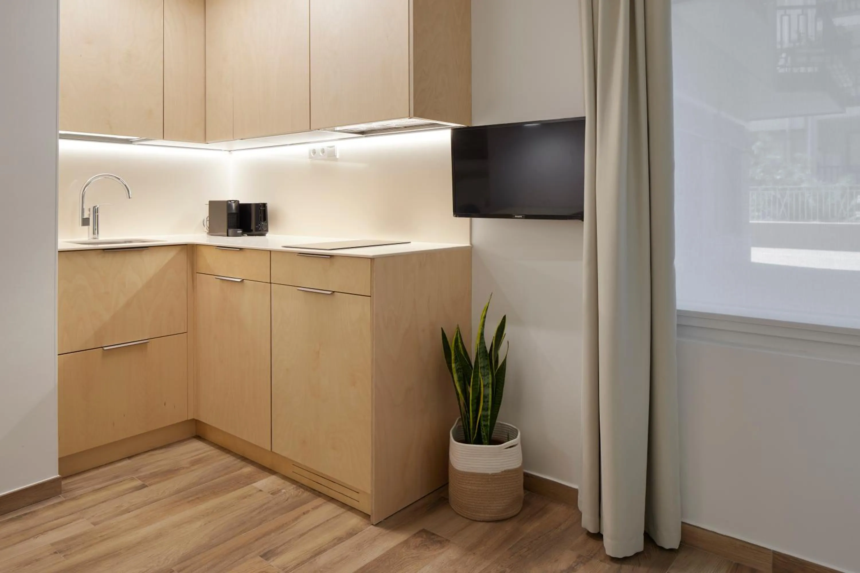 Kitchen or kitchenette in Apartamentos Isaga