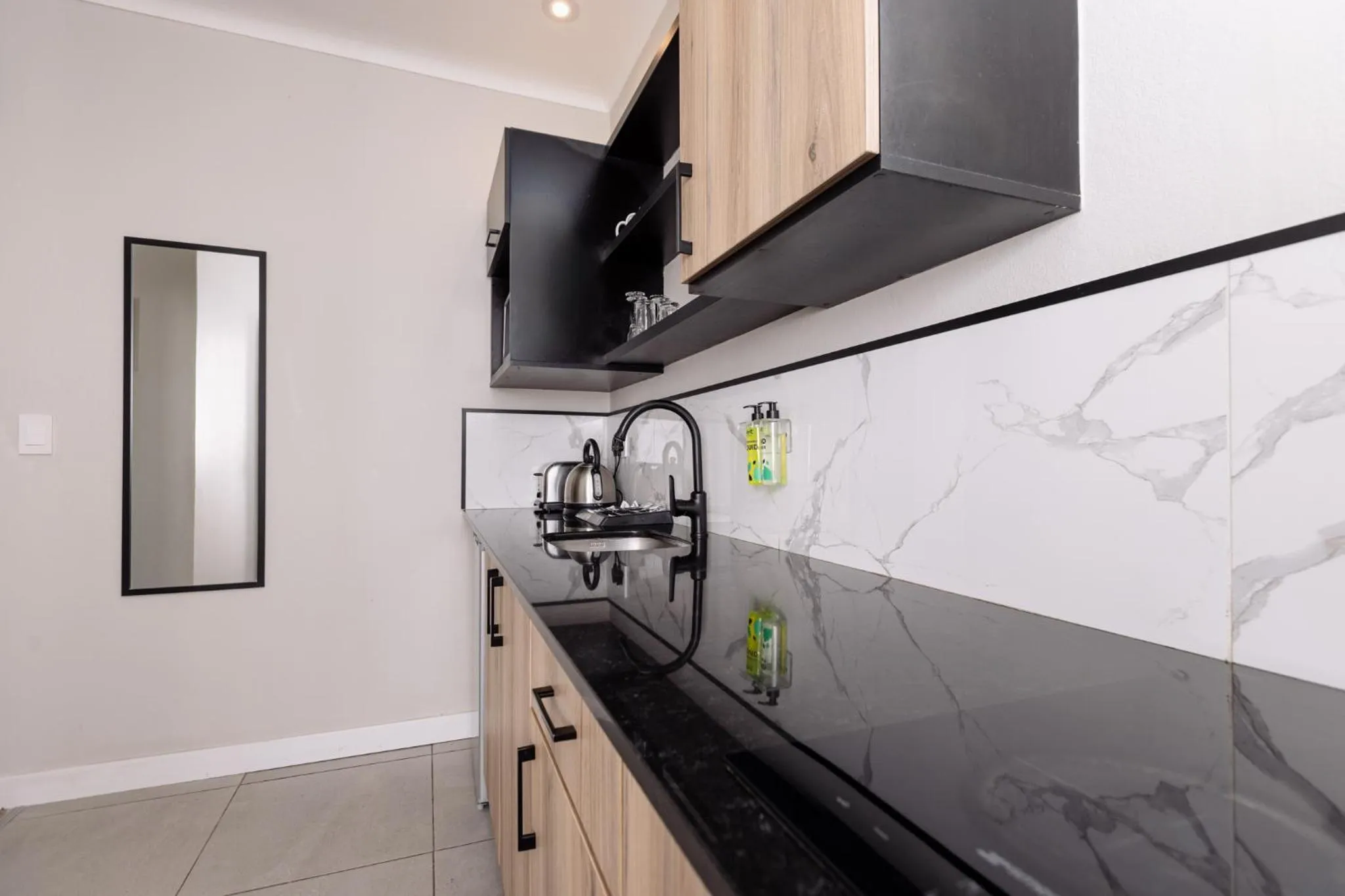 Kitchen or kitchenette in MINT Hotel 84 on Katherine