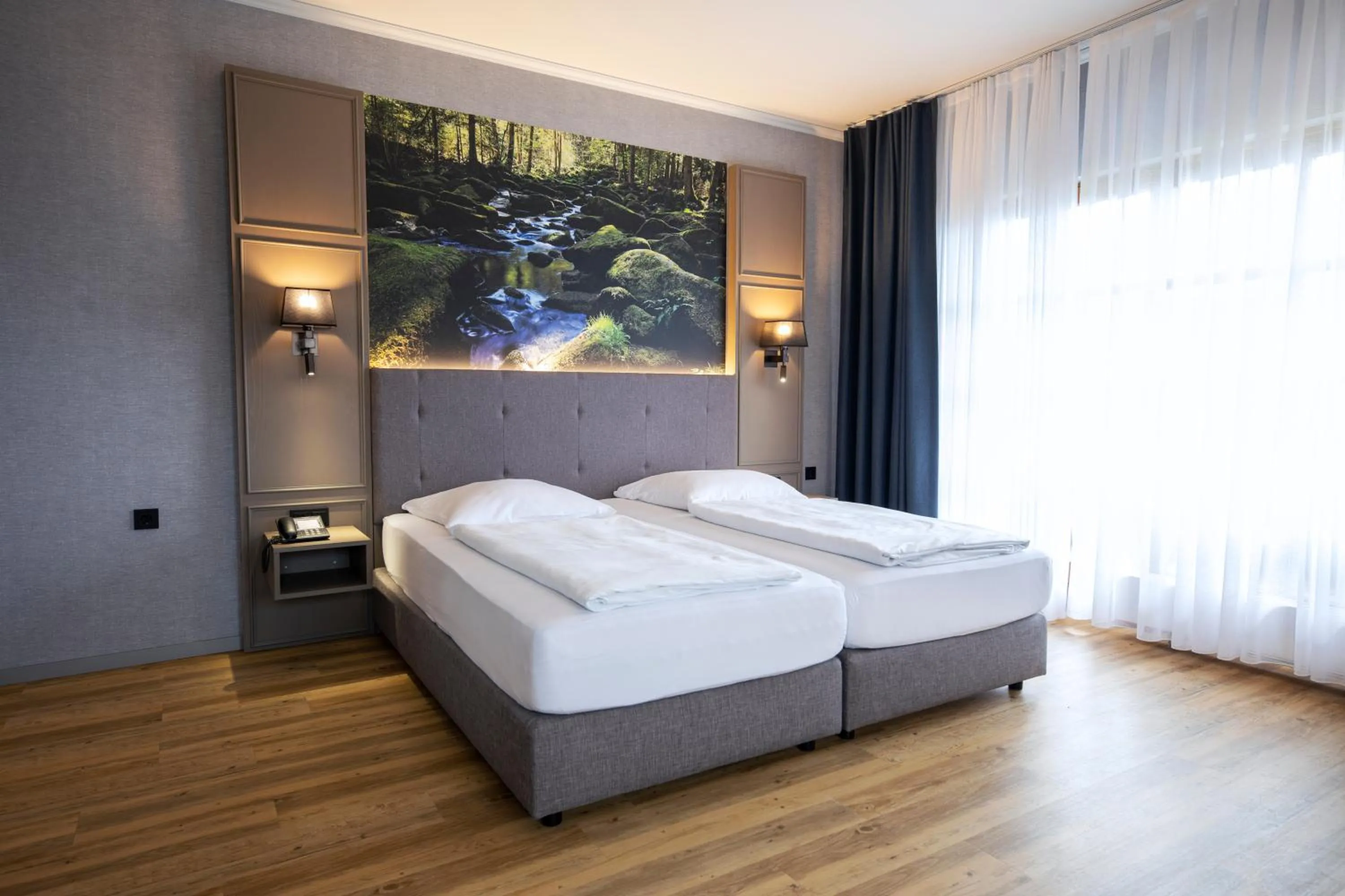Photo of the whole room, Bed in Roomingtons City Waldkirchen