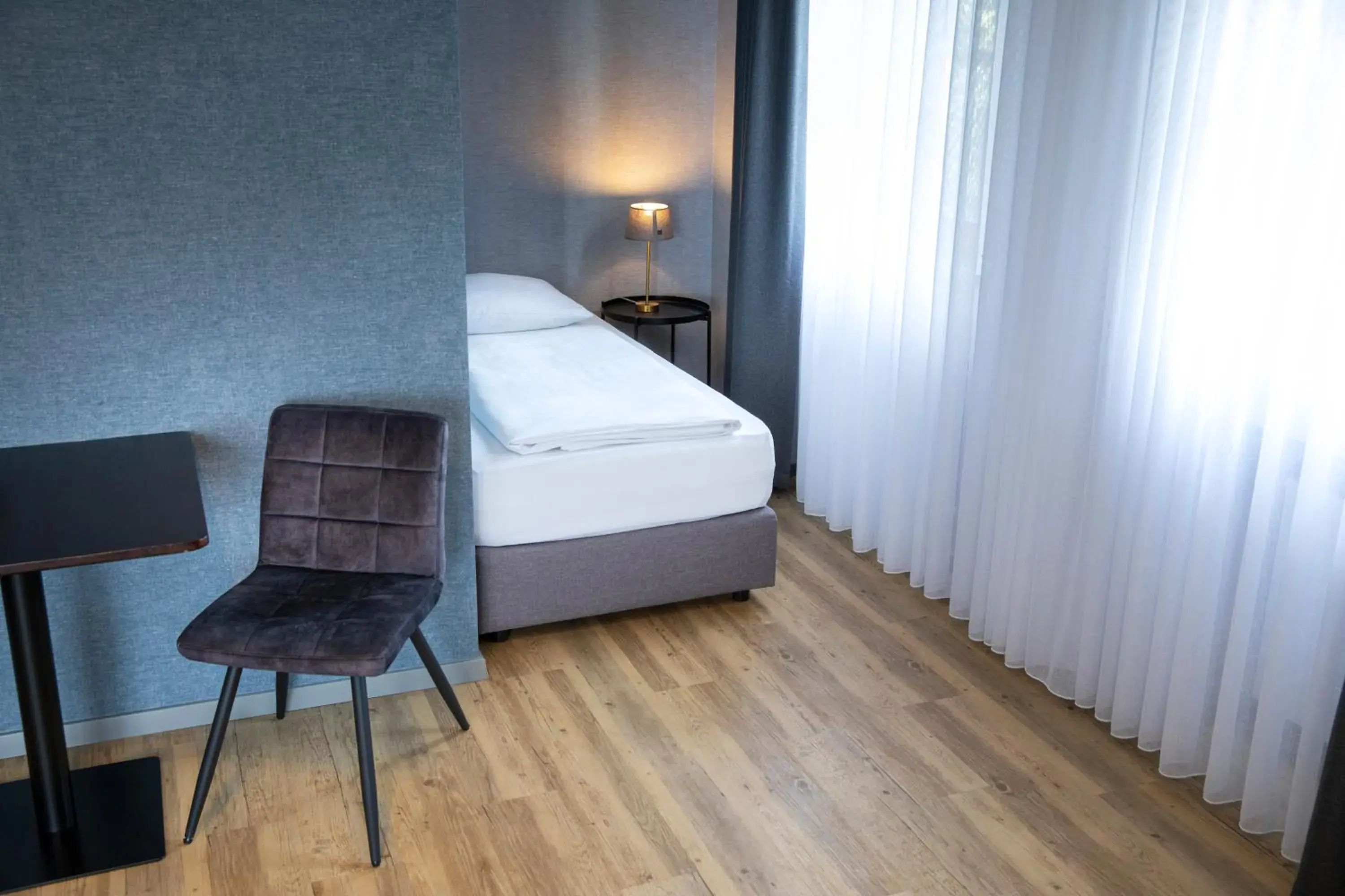 Photo of the whole room, Bed in Roomingtons City Waldkirchen Photo of the whole room, Bed in Roomingtons City Waldkirchen