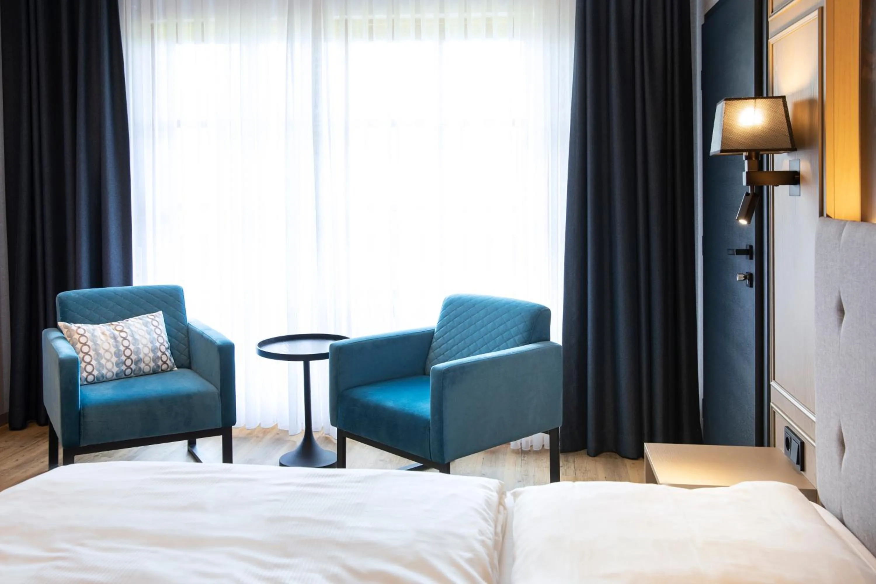 Photo of the whole room, Bed in Roomingtons City Waldkirchen