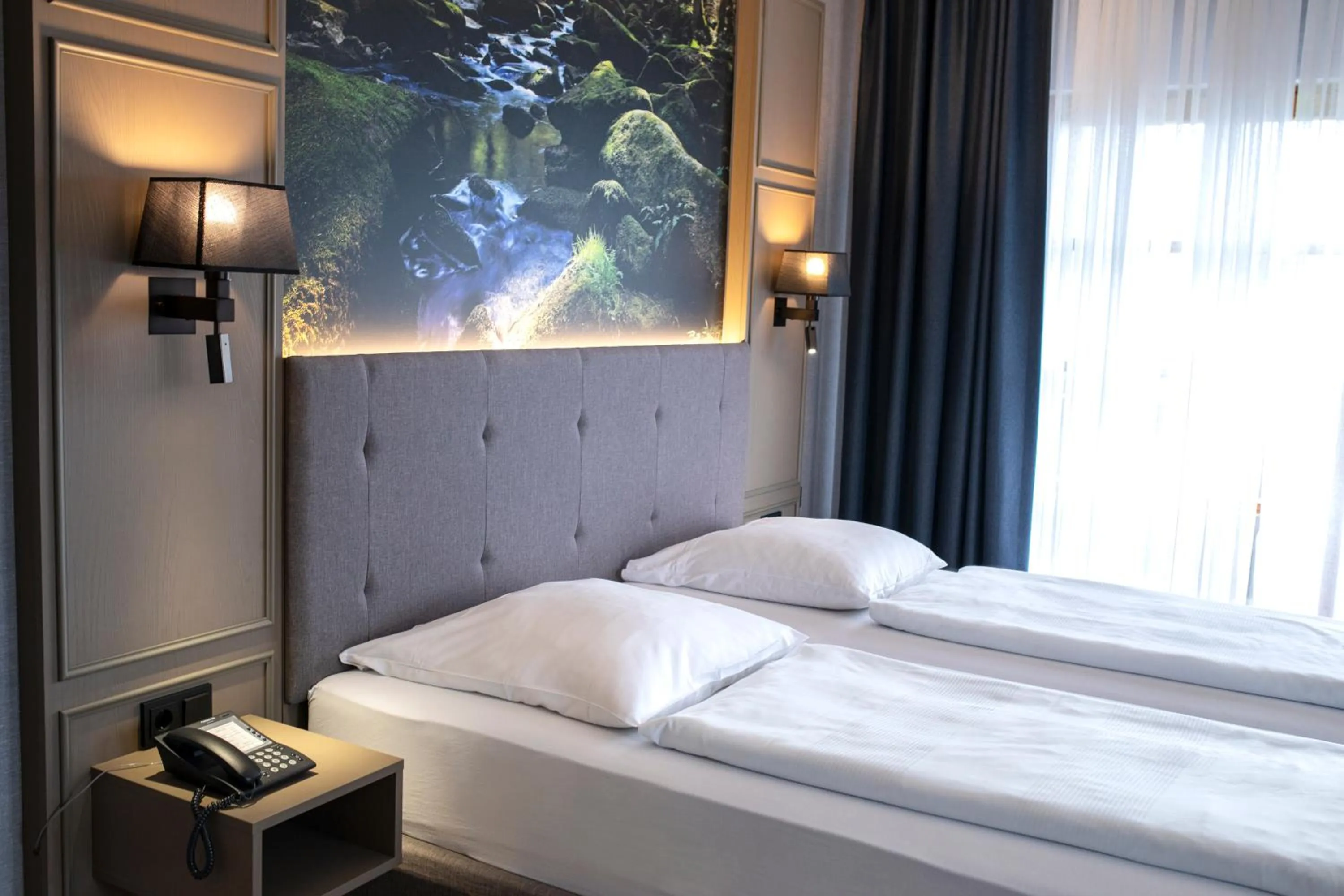 Photo of the whole room, Bed in Roomingtons City Waldkirchen