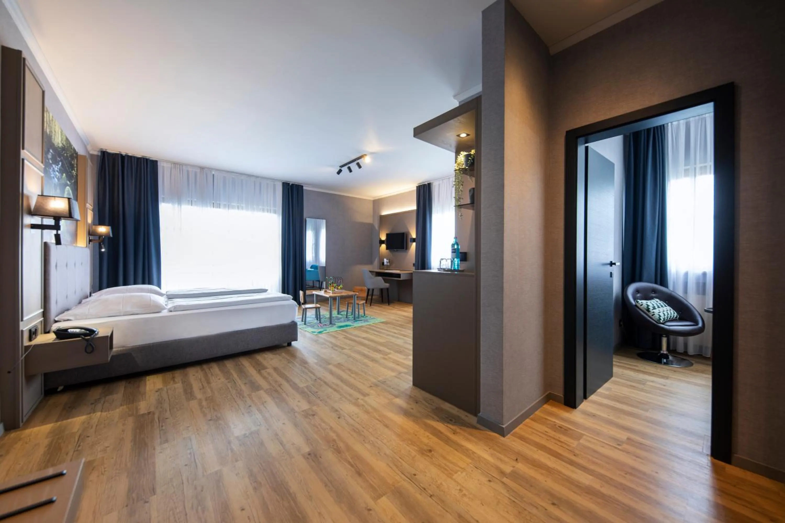 Photo of the whole room, Bed in Roomingtons City Waldkirchen