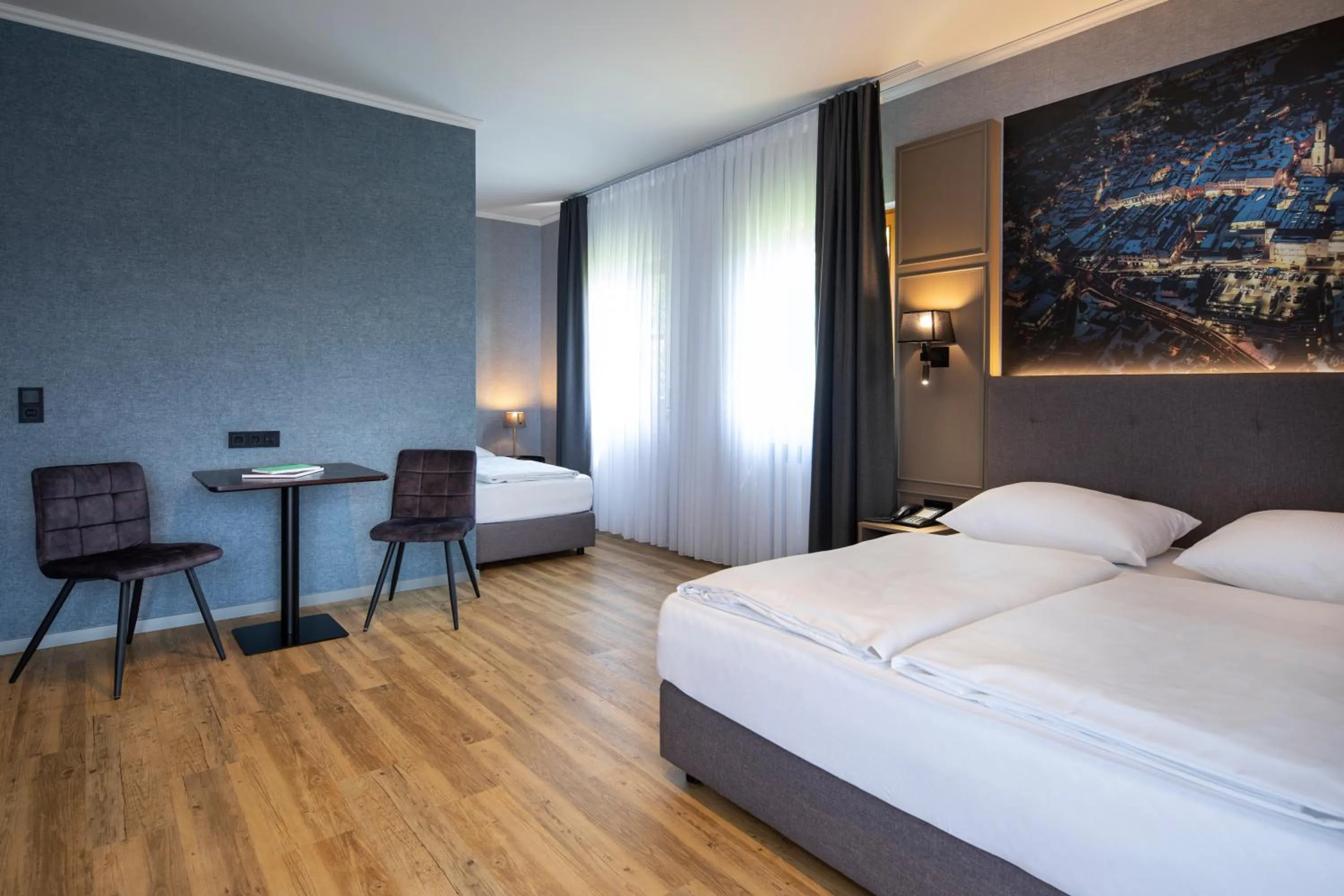 Photo of the whole room, Bed in Roomingtons City Waldkirchen