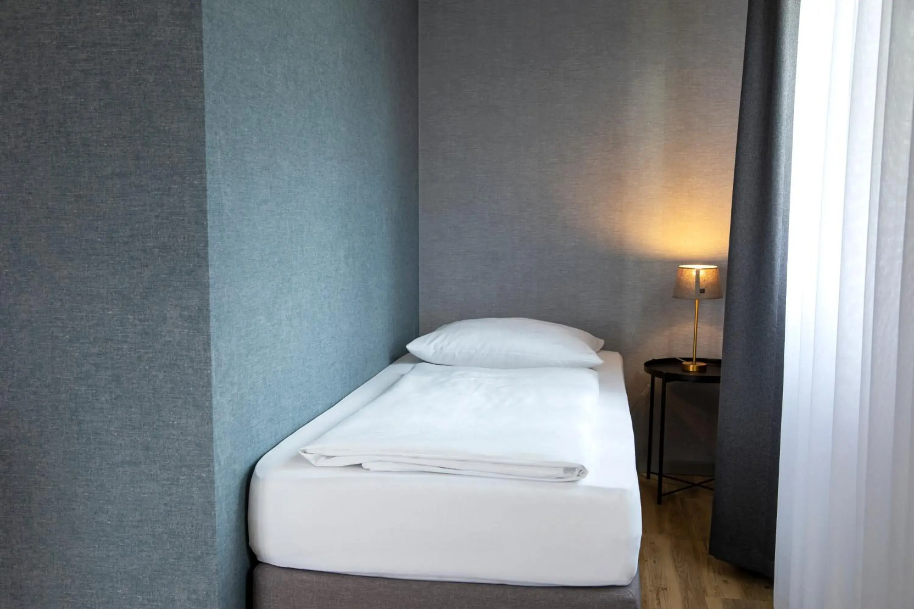 Photo of the whole room, Bed in Roomingtons City Waldkirchen Photo of the whole room, Bed in Roomingtons City Waldkirchen