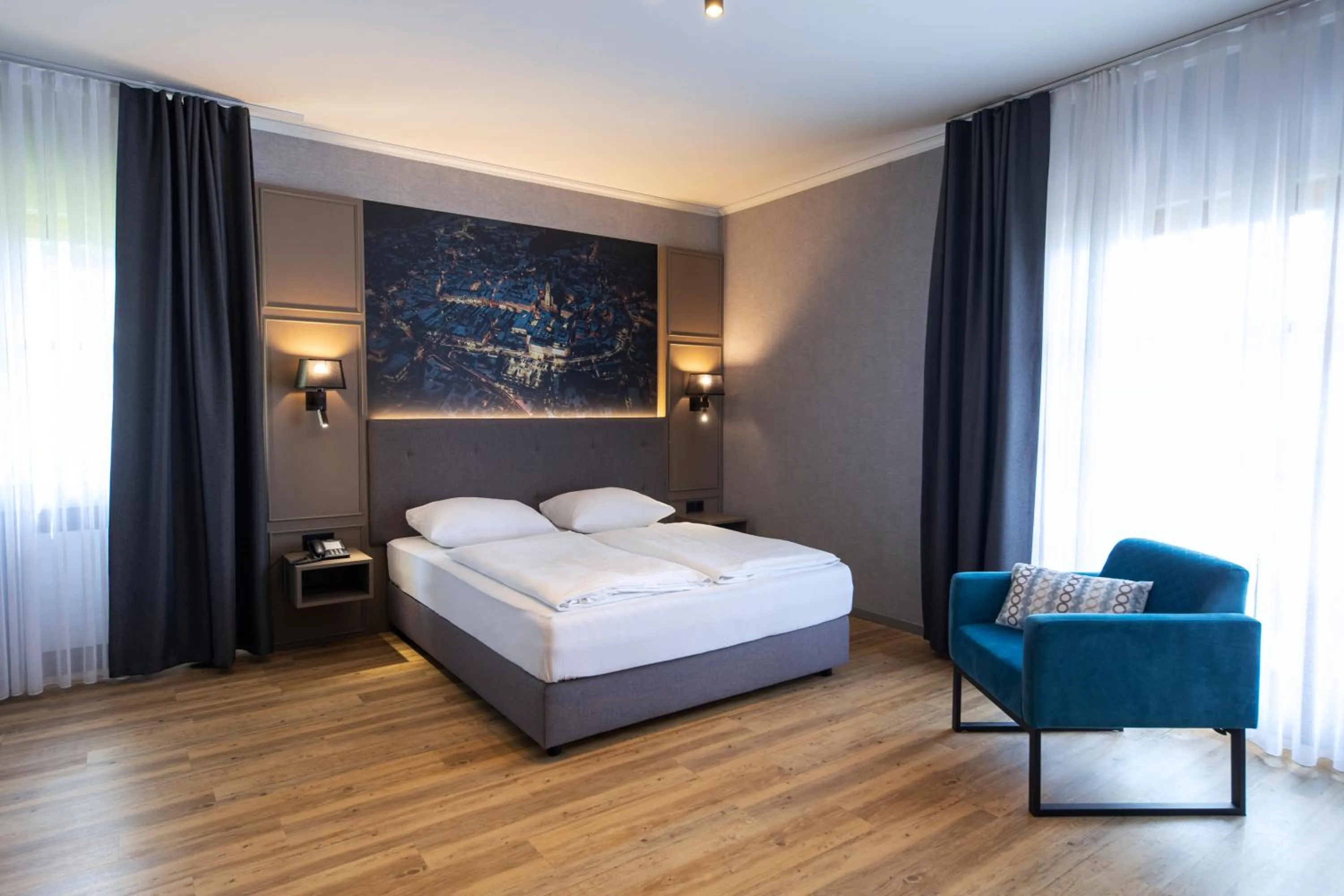 Photo of the whole room, Bed in Roomingtons City Waldkirchen