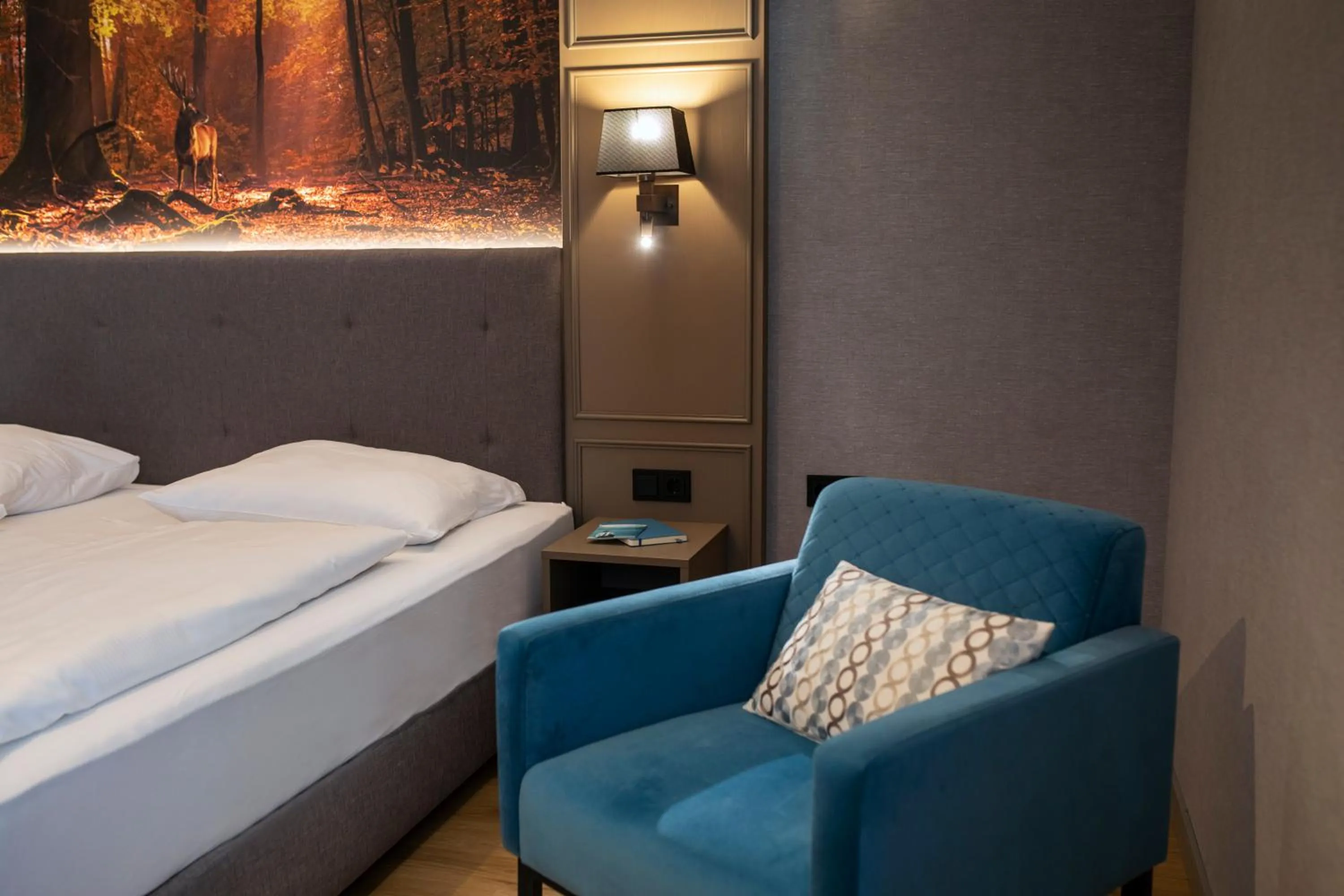 Photo of the whole room, Bed in Roomingtons City Waldkirchen