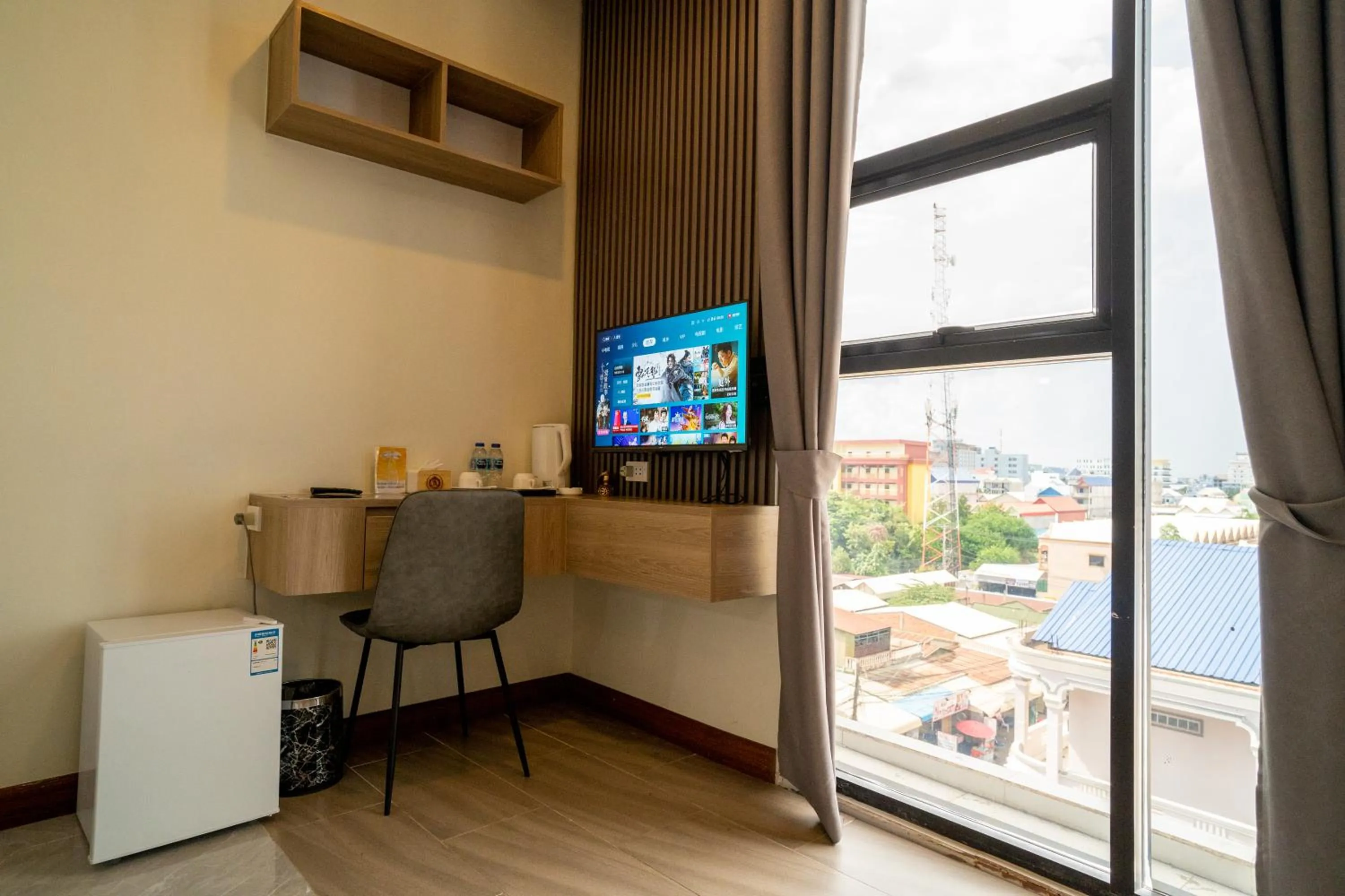 Communal lounge/ TV room in Hak Heng Hotel