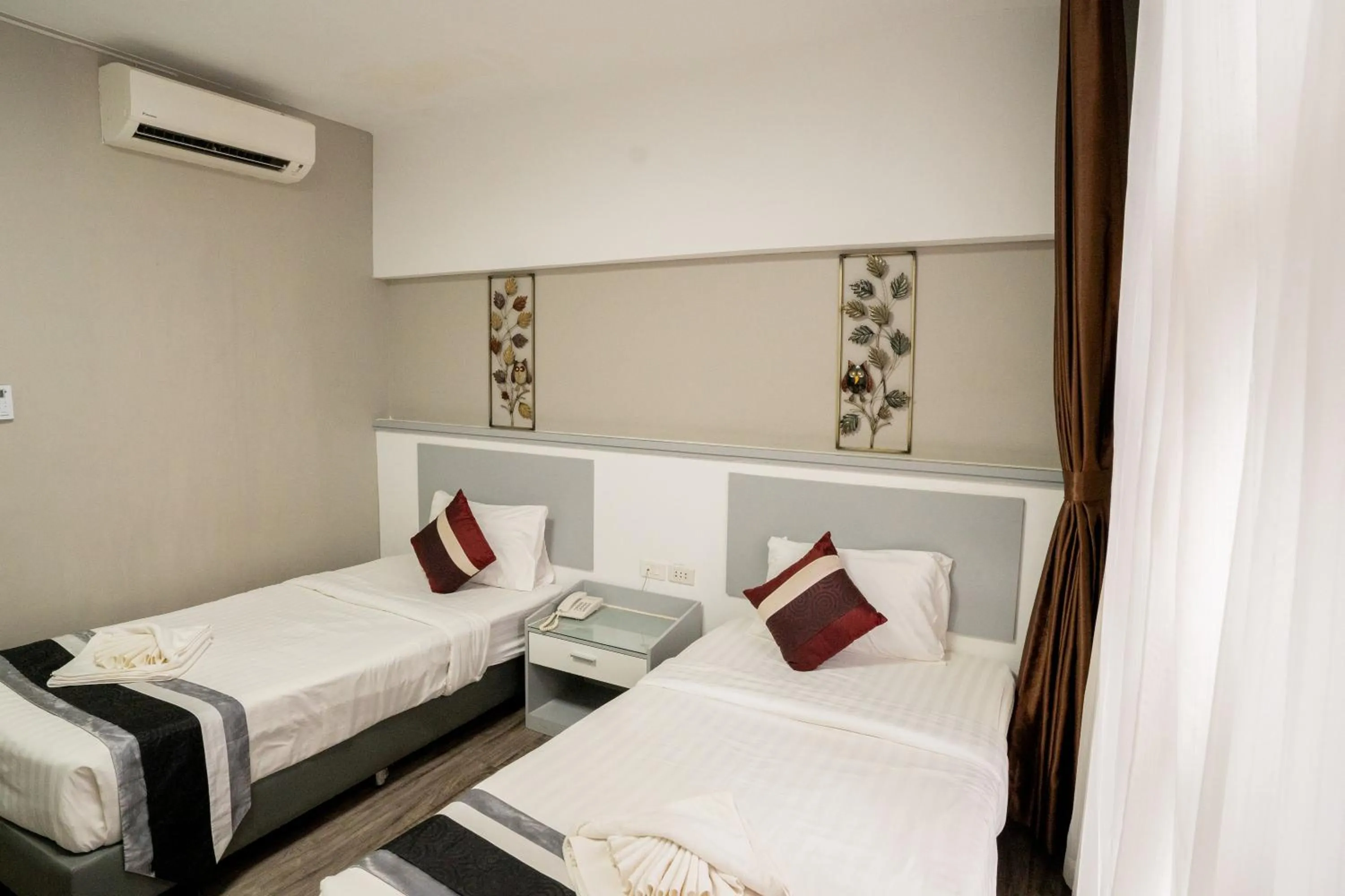 Bedroom in Hak Heng Hotel