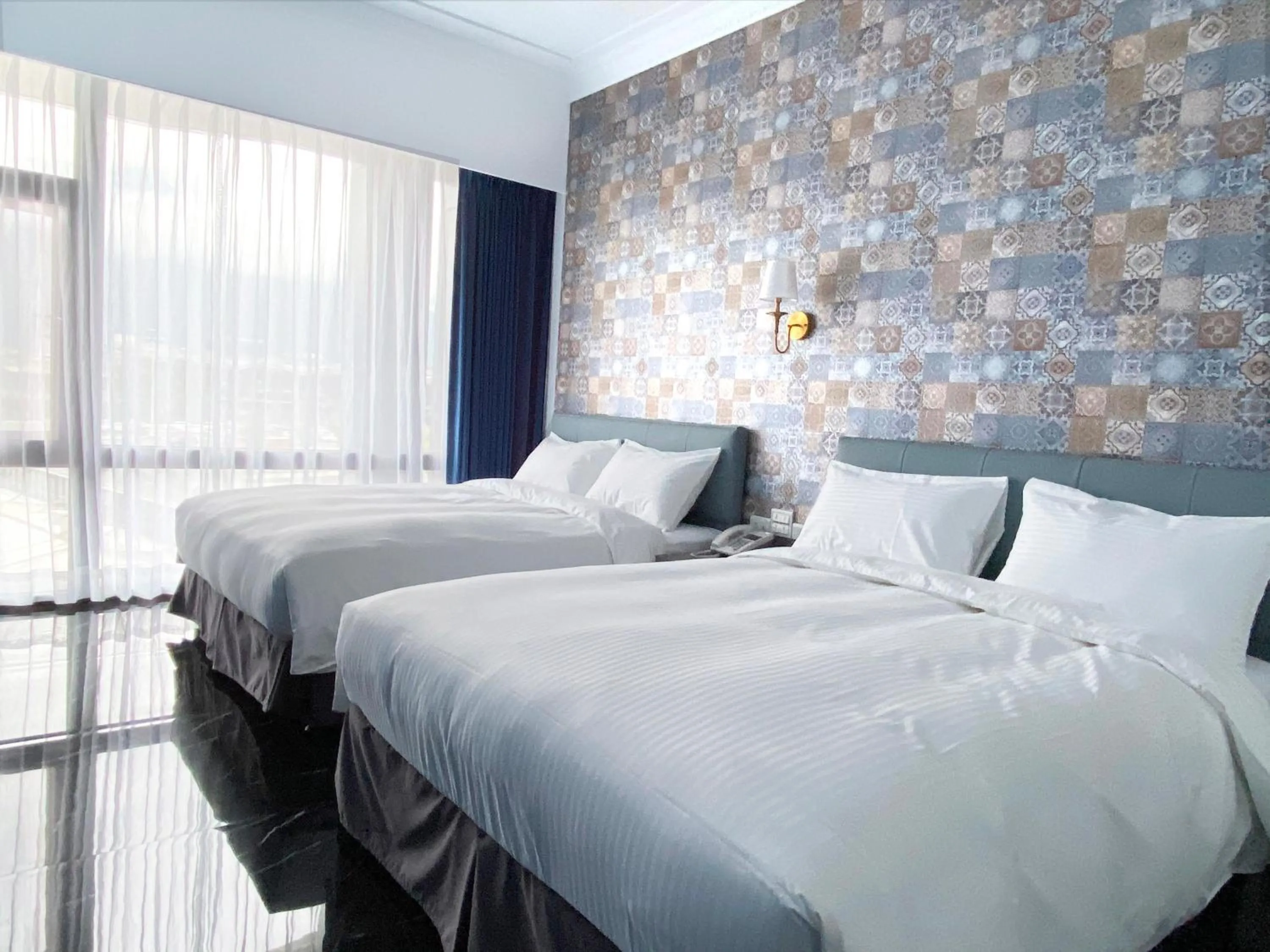 Bed in Champ De Rose Hotel