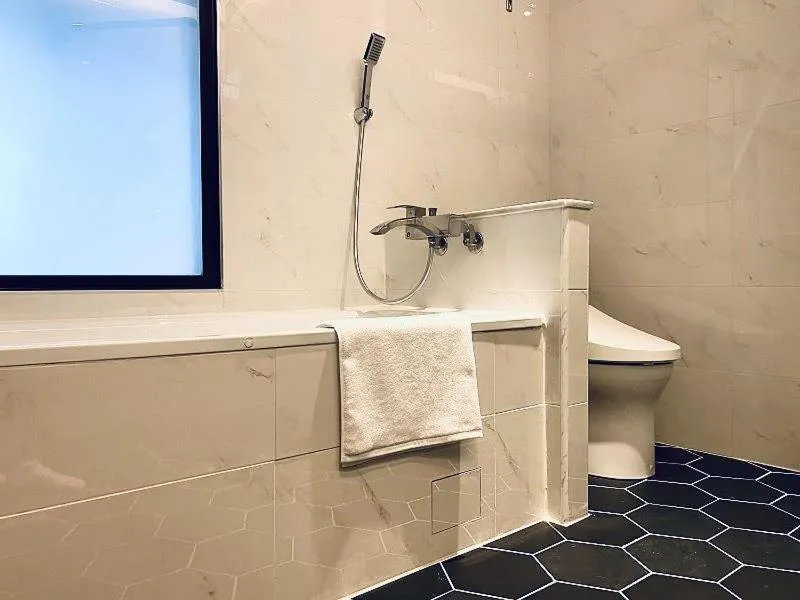 Bathroom in Champ De Rose Hotel