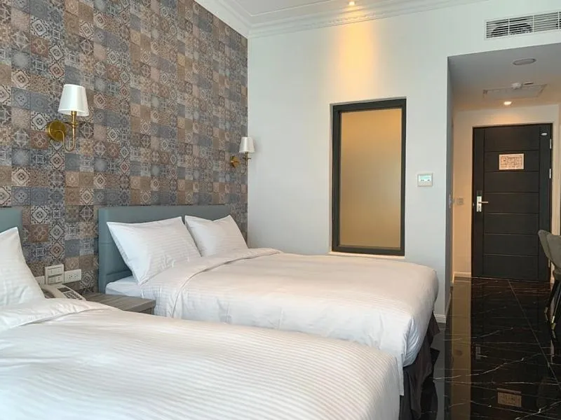 Bed in Champ De Rose Hotel