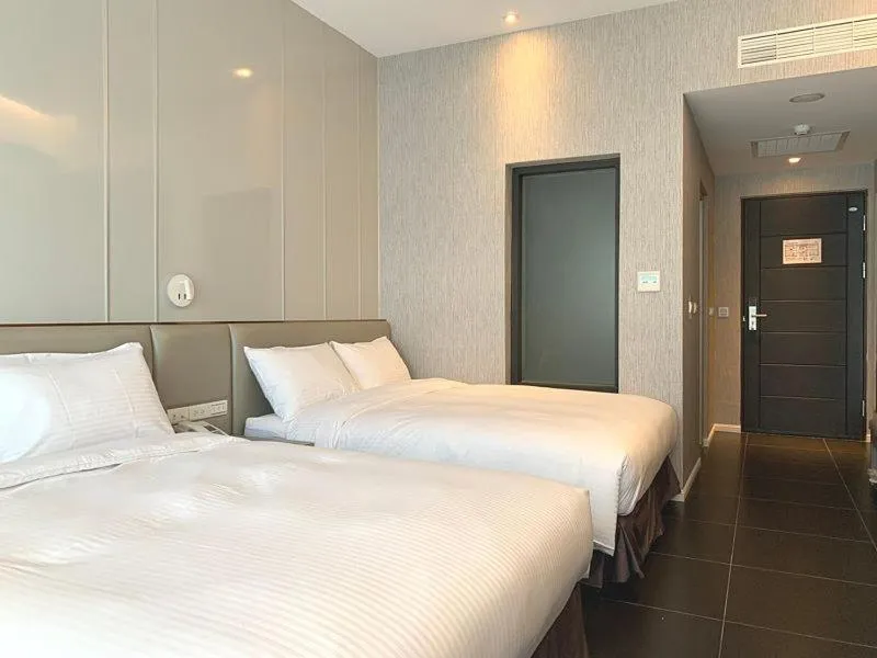 Bed in Champ De Rose Hotel