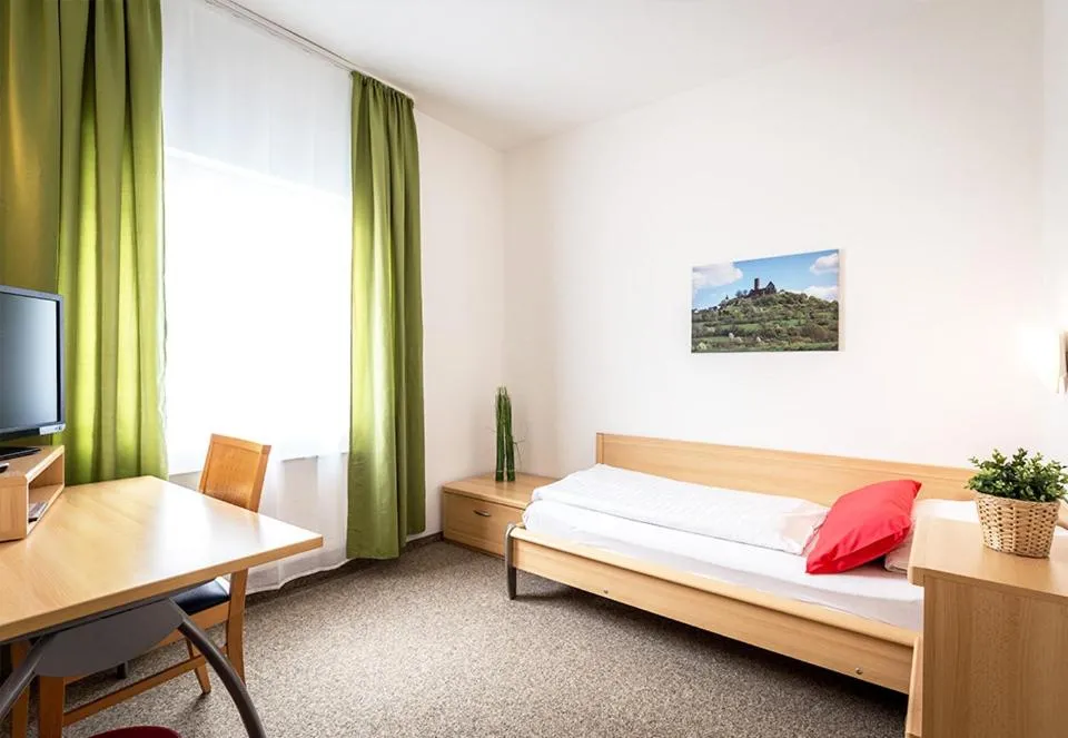 Bed in Hotel an der Burg